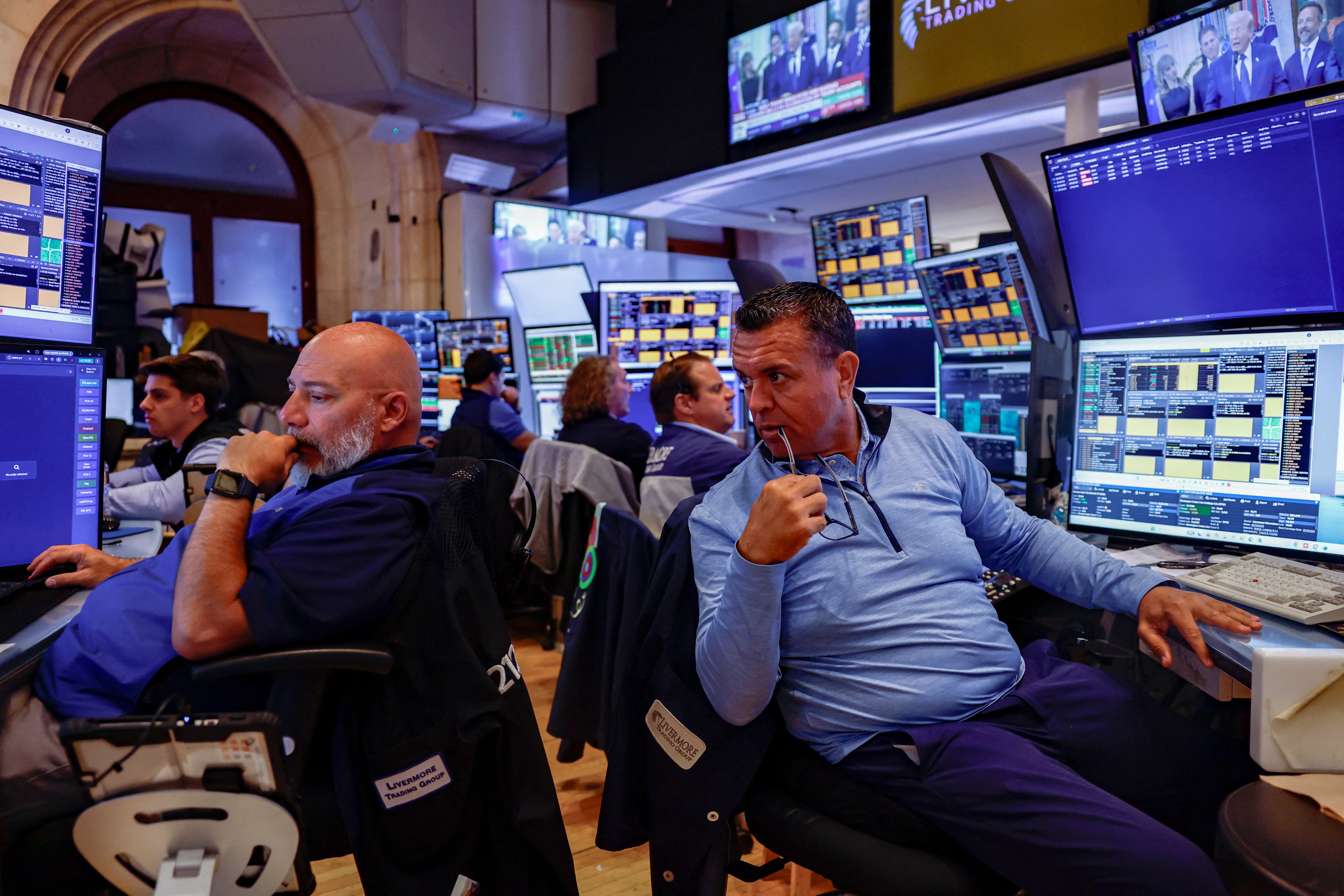 Traders work on the floor of the New York Stock Exchange (NYSE) in New York City, U.S., July 6, 2026. REUTERS/Jeenah Moon