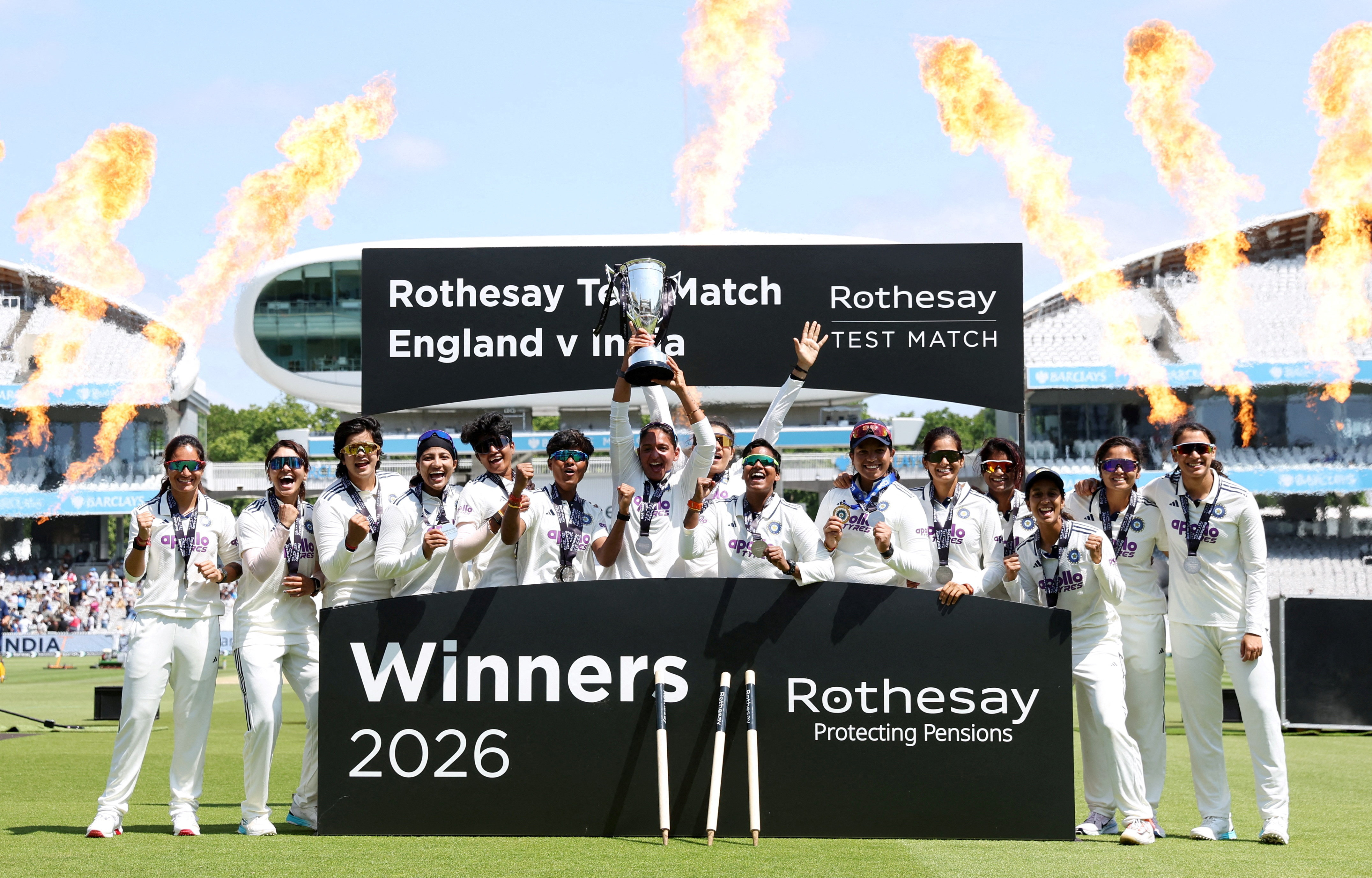 Cricket - Women's Test Match - England v India - Lord's Cricket Ground, London, Britain - July 13, 2026 India players celebrate with the trophy after winning the one-off test match Action Images via Reuters/Cat Goryn TPX IMAGES OF THE DAY