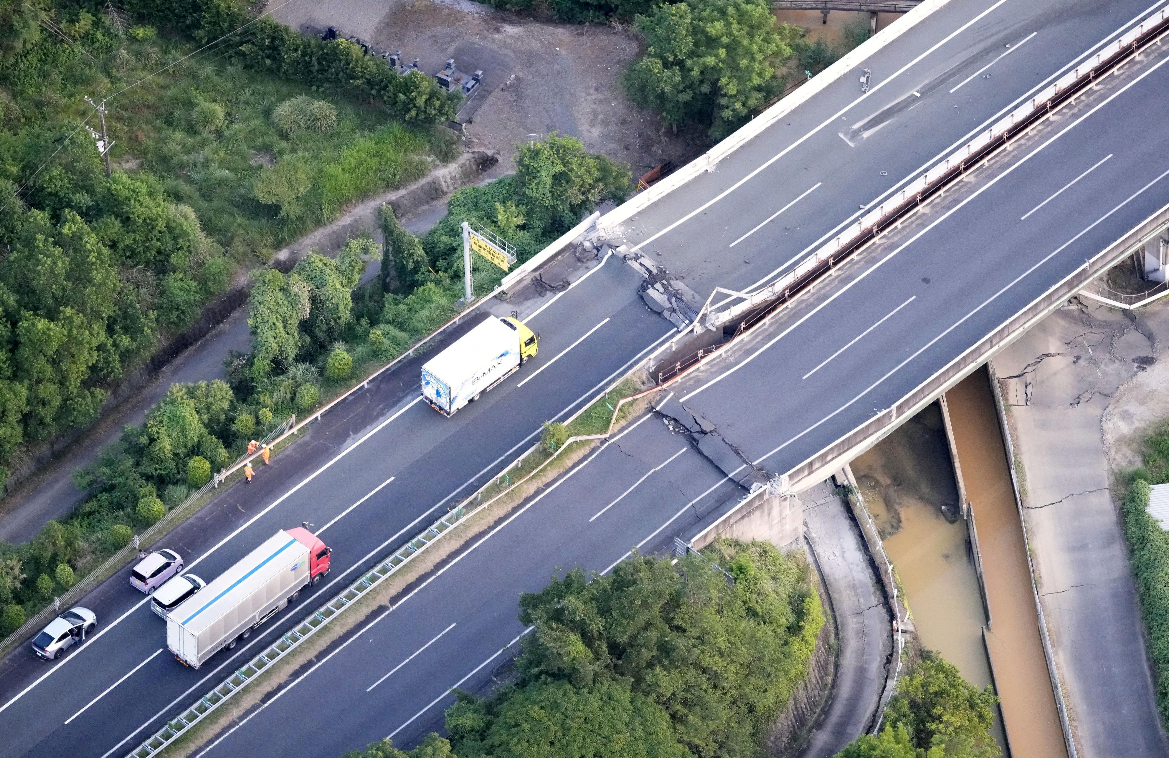 An aerial view shows the damaged Kyushu Expressway after an earthquake with a preliminary magnitude of 7.1 struck Japan's southern Kumamoto prefecture, in Yatsushiro, Kumamoto prefecture, Japan, July 28, 2026. Kyodo/via REUTERS ATTENTION EDITORS - THIS IMAGE HAS BEEN SUPPLIED BY A THIRD PARTY. MANDATORY CREDIT. JAPAN OUT. NO COMMERCIAL OR EDITORIAL SALES IN JAPAN. TPX IMAGES OF THE DAY