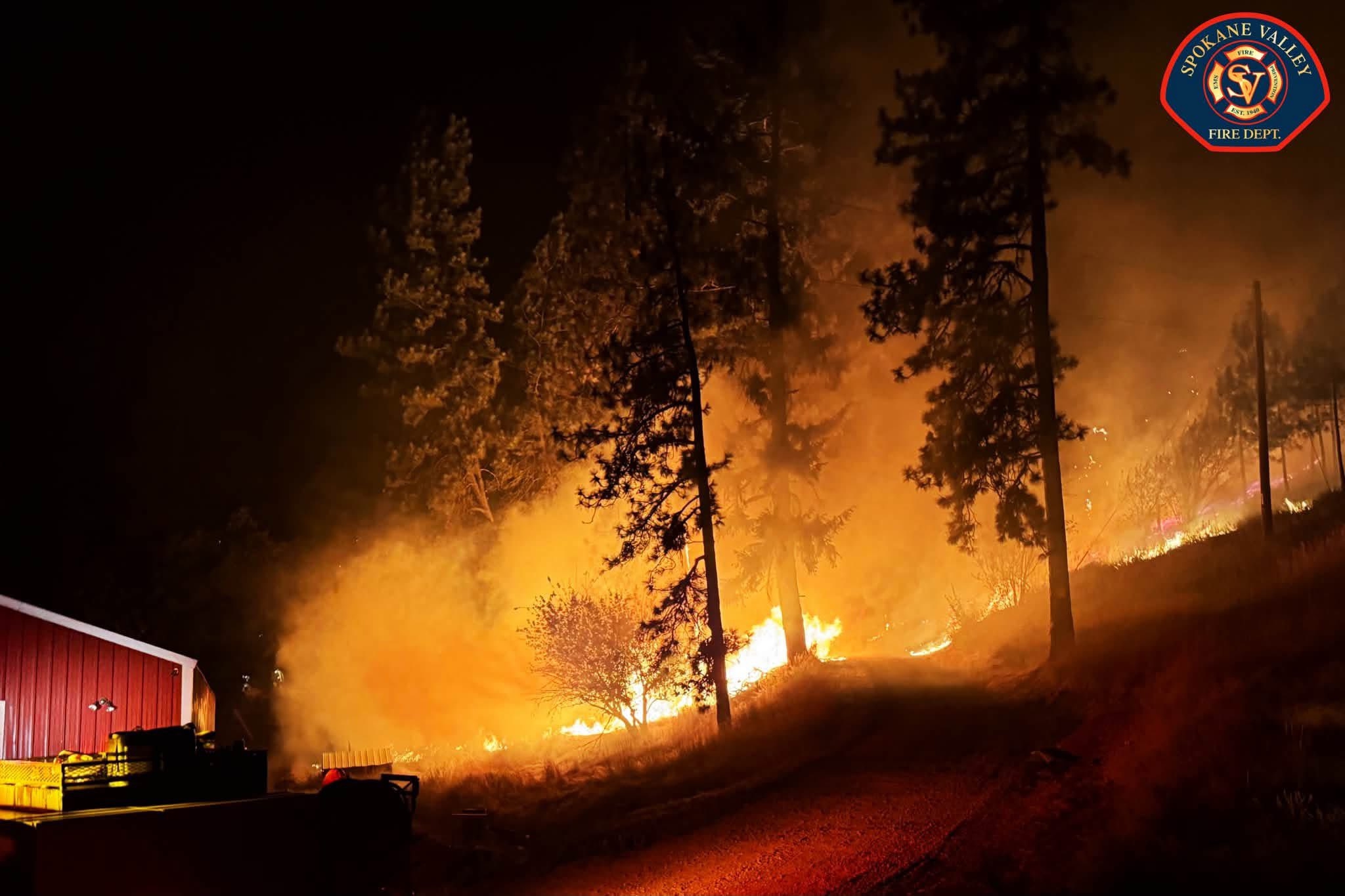 A handout photo made available by the Spokane Valley Fire Department shows the Fairview Fire northeast of Spokane, Washington [EPA]