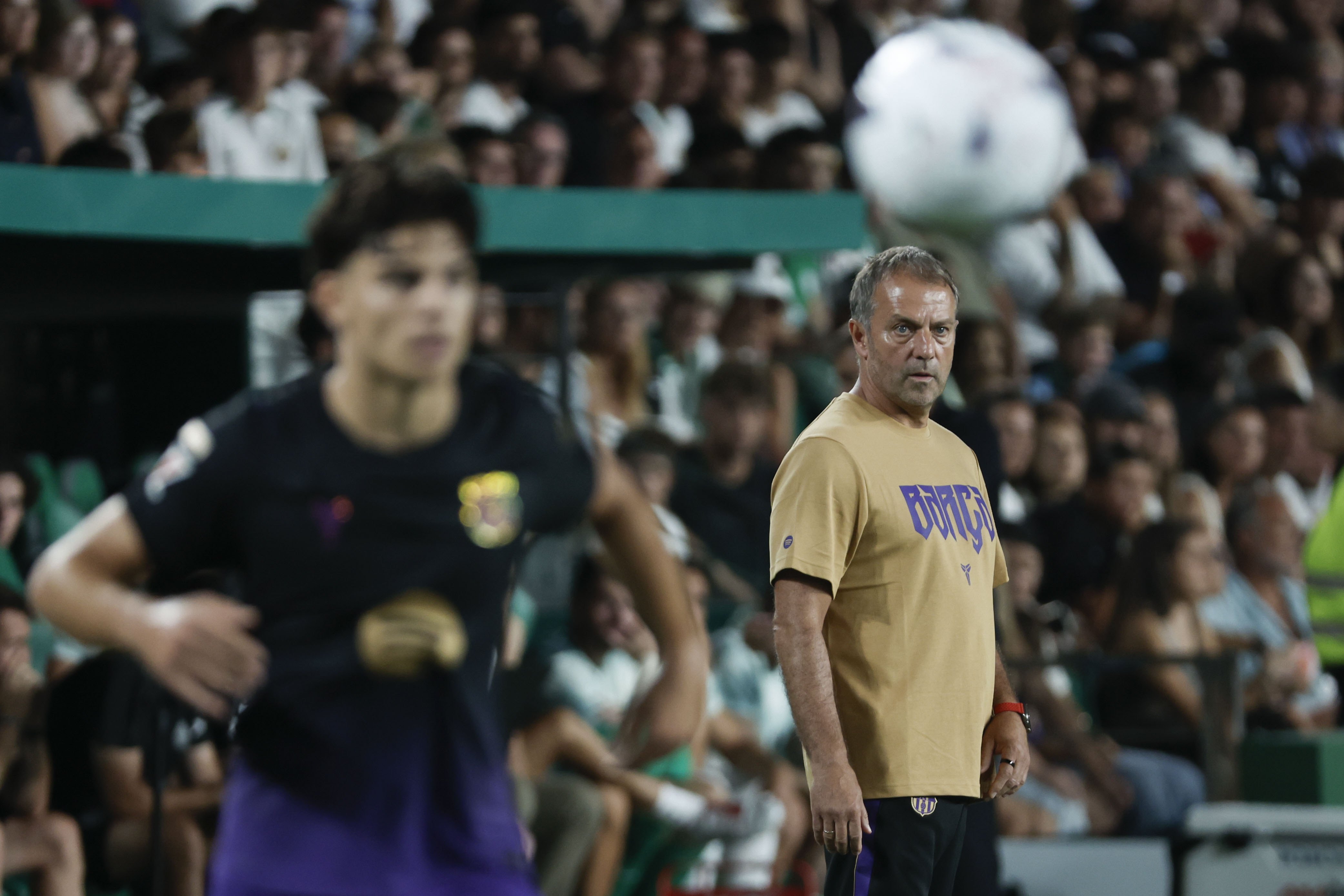 Barcelona's head coach German Hansi Flick reacts during the Spanish LaLiga soccer match between Elche FC and FC Barcelona
