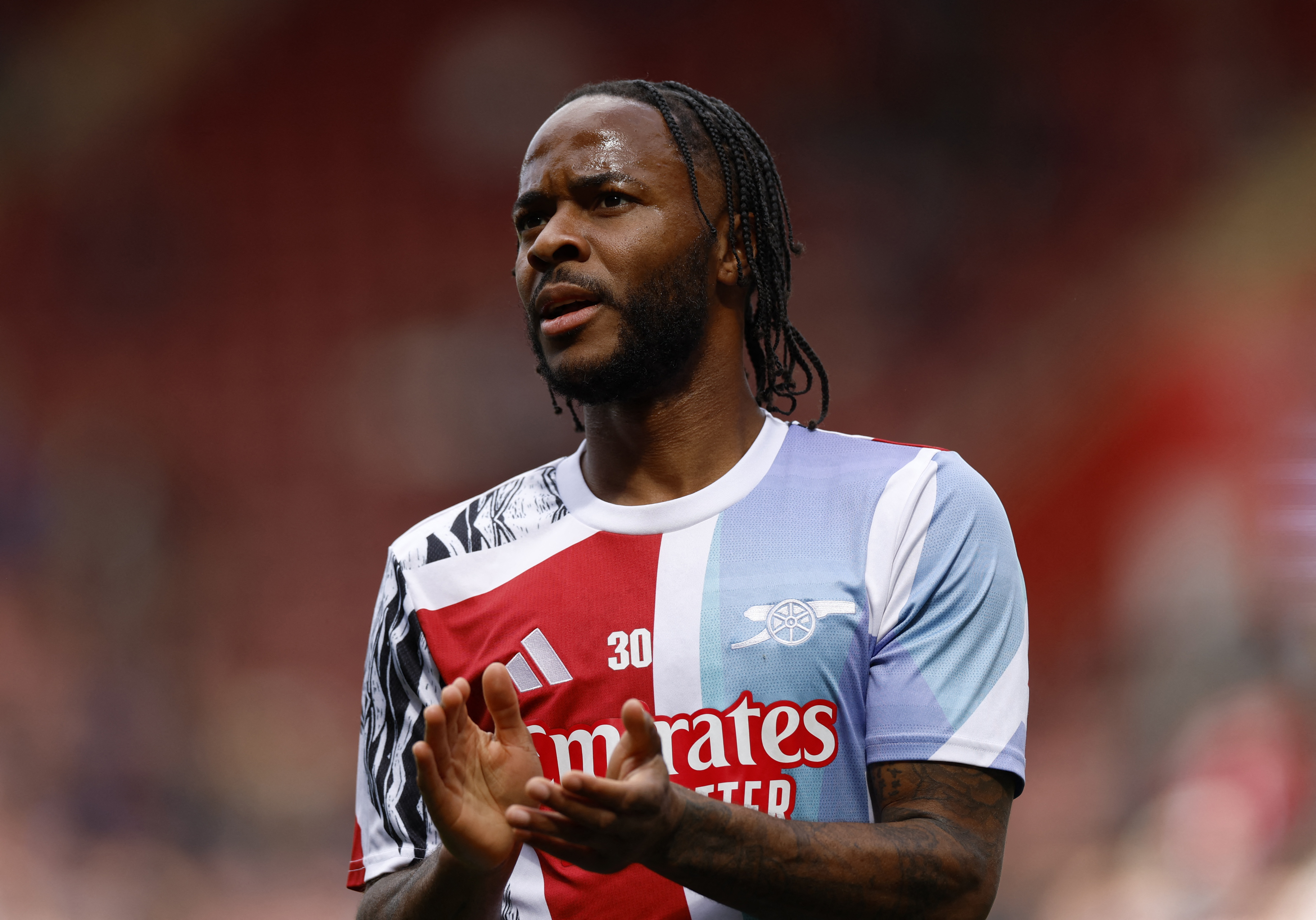 Soccer Football - Premier League - Southampton v Arsenal - St Mary's Stadium, Southampton, Britain - May 25, 2025 Arsenal's Raheem Sterling during the warm up before the match Action Images via Reuters/Peter Cziborra EDITORIAL USE ONLY. NO USE WITH UNAUTHORIZED AUDIO, VIDEO, DATA, FIXTURE LISTS, CLUB/LEAGUE LOGOS OR 'LIVE' SERVICES. ONLINE IN-MATCH USE LIMITED TO 120 IMAGES, NO VIDEO EMULATION. NO USE IN BETTING, GAMES OR SINGLE CLUB/LEAGUE/PLAYER PUBLICATIONS. PLEASE CONTACT YOUR ACCOUNT REPRESENTATIVE FOR FURTHER DETAILS..