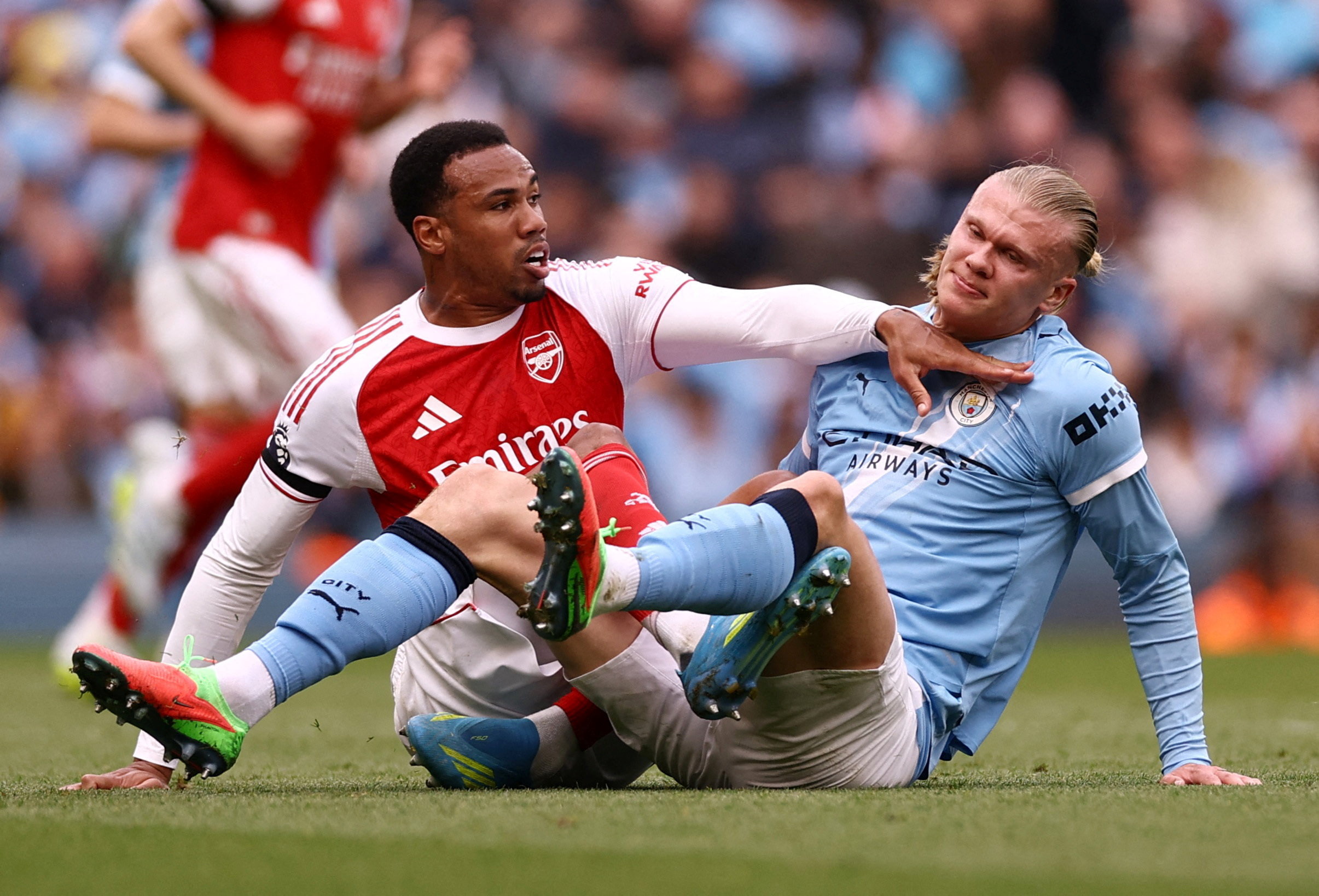 Arsenal’s Gabriel Magalhaes tussles with Manchester City’s Erling Haaland during a feisty Premier League clash last season