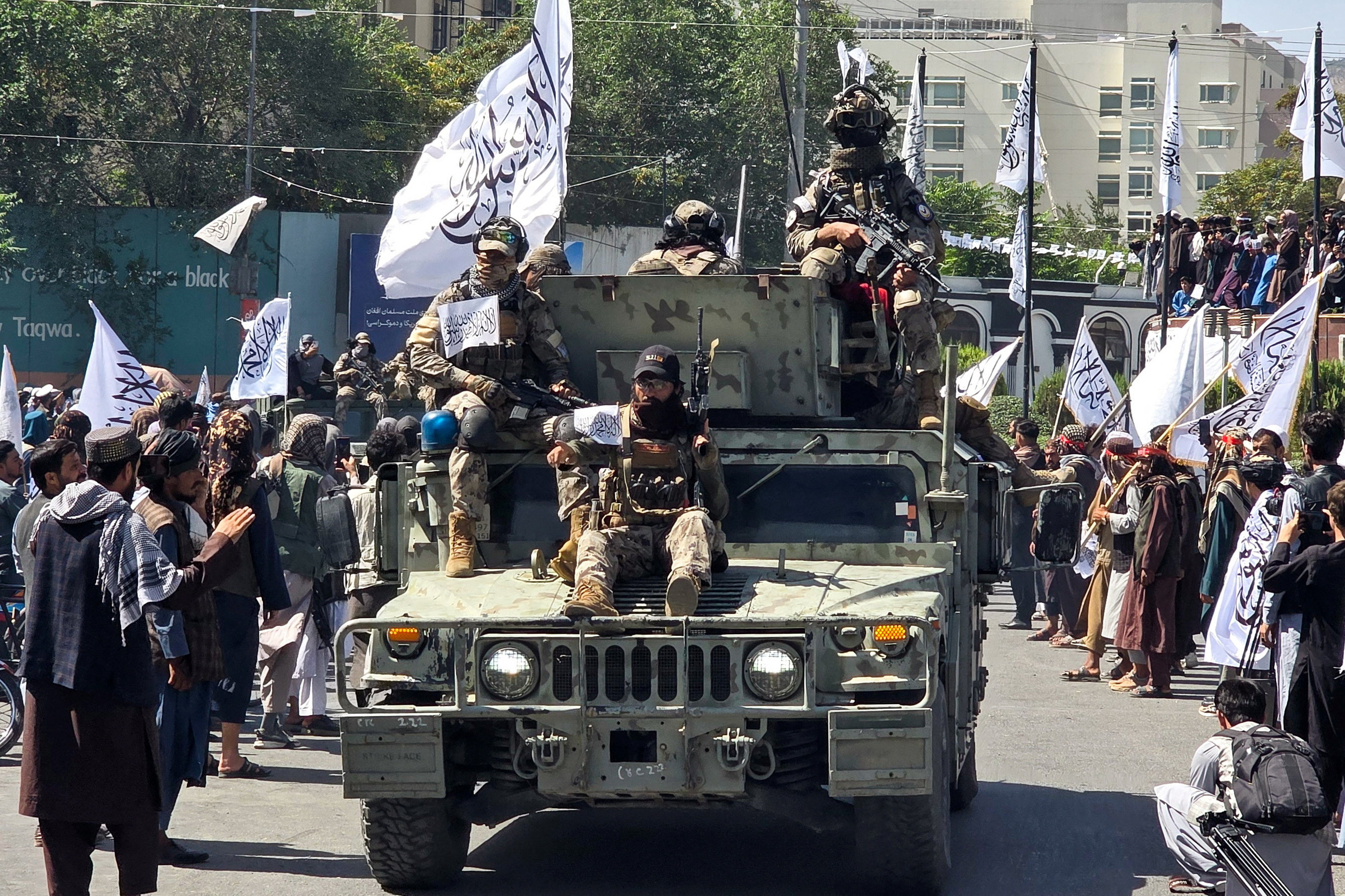 Members of the Taliban attend a rally to mark five years in power, outside the former U.S. embassy in Kabul, Afghanistan, on August 15, 2026. [Mohammad Yunus Yawar/Reuters]