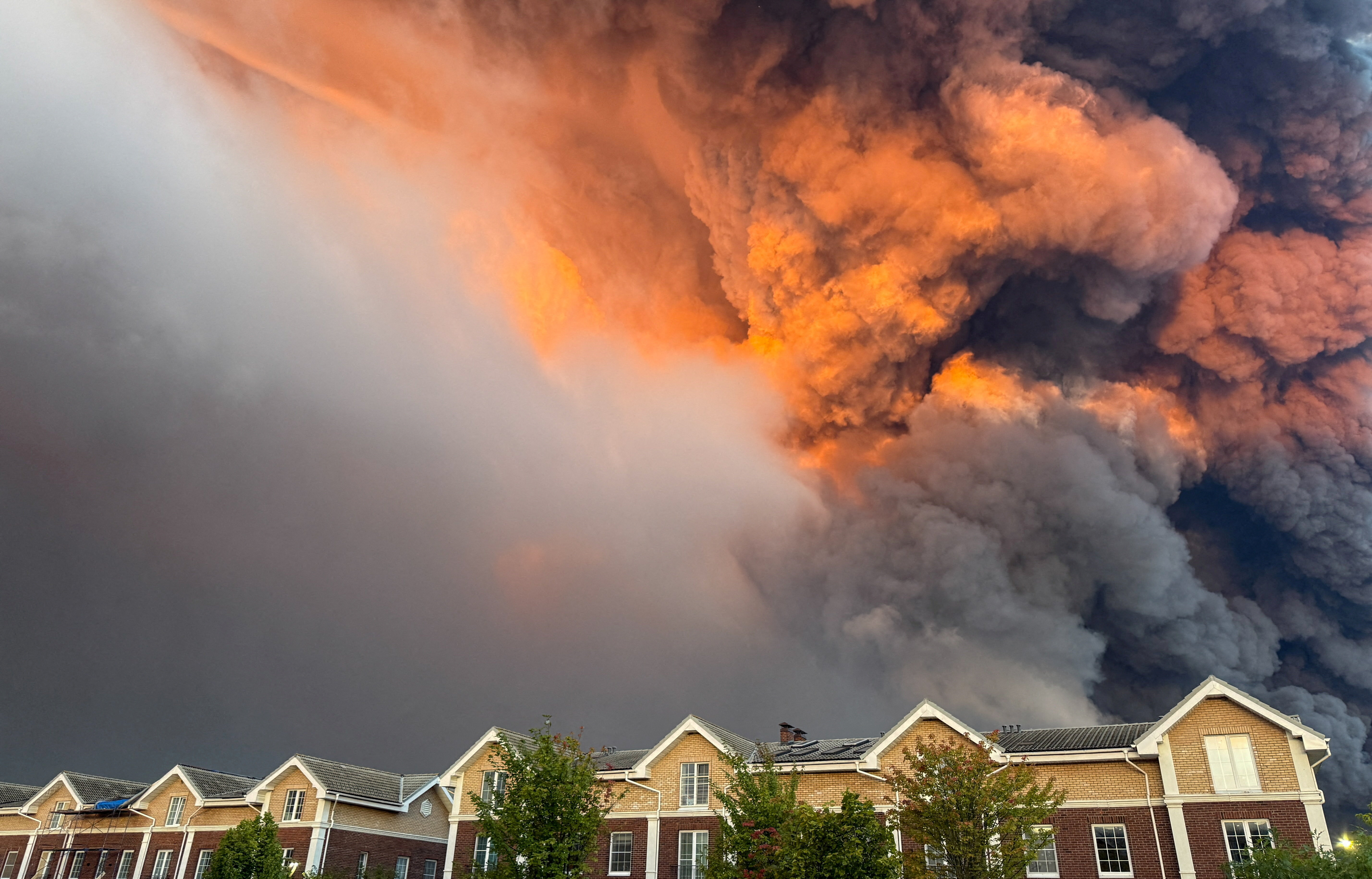 Smoke billows from the burning Wildberries warehouses following a Ukrainian drone attack in Koledino, Moscow Region, Russia, on August 16, 2026. [Reuters]