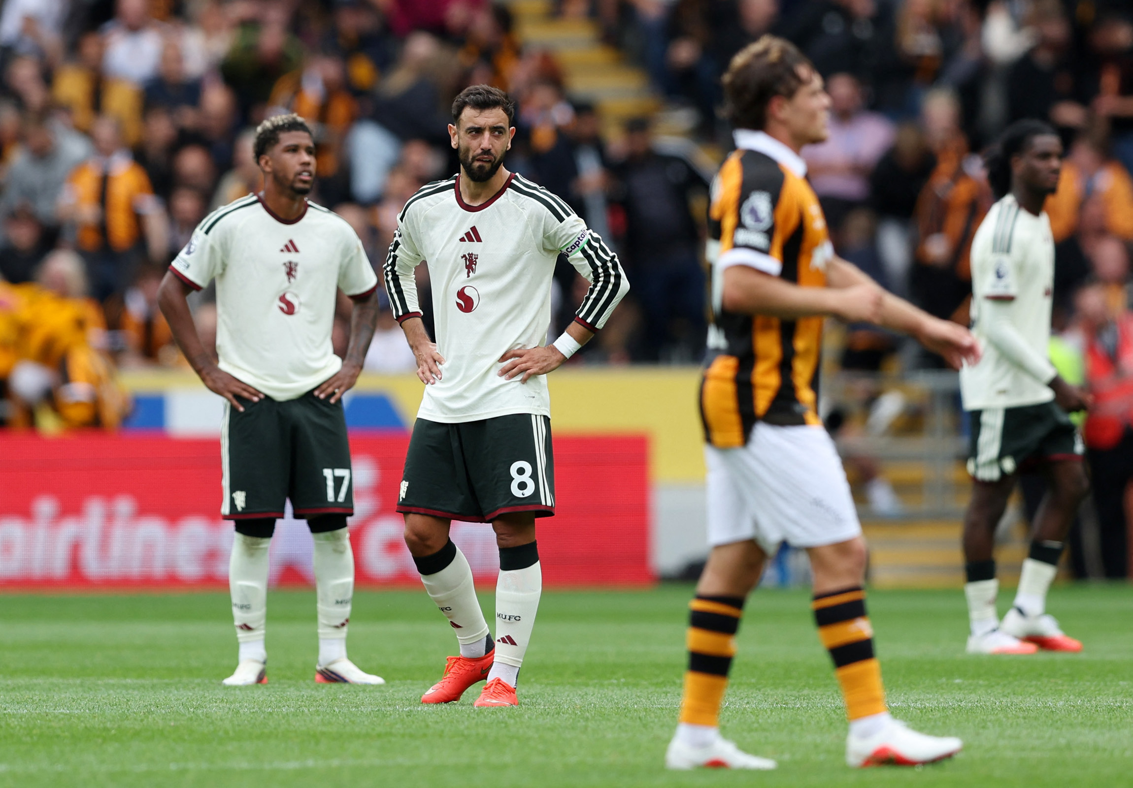 Manchester United's Bruno Fernandes reacts after Hull City's Nobel Mendy scores their second goal
