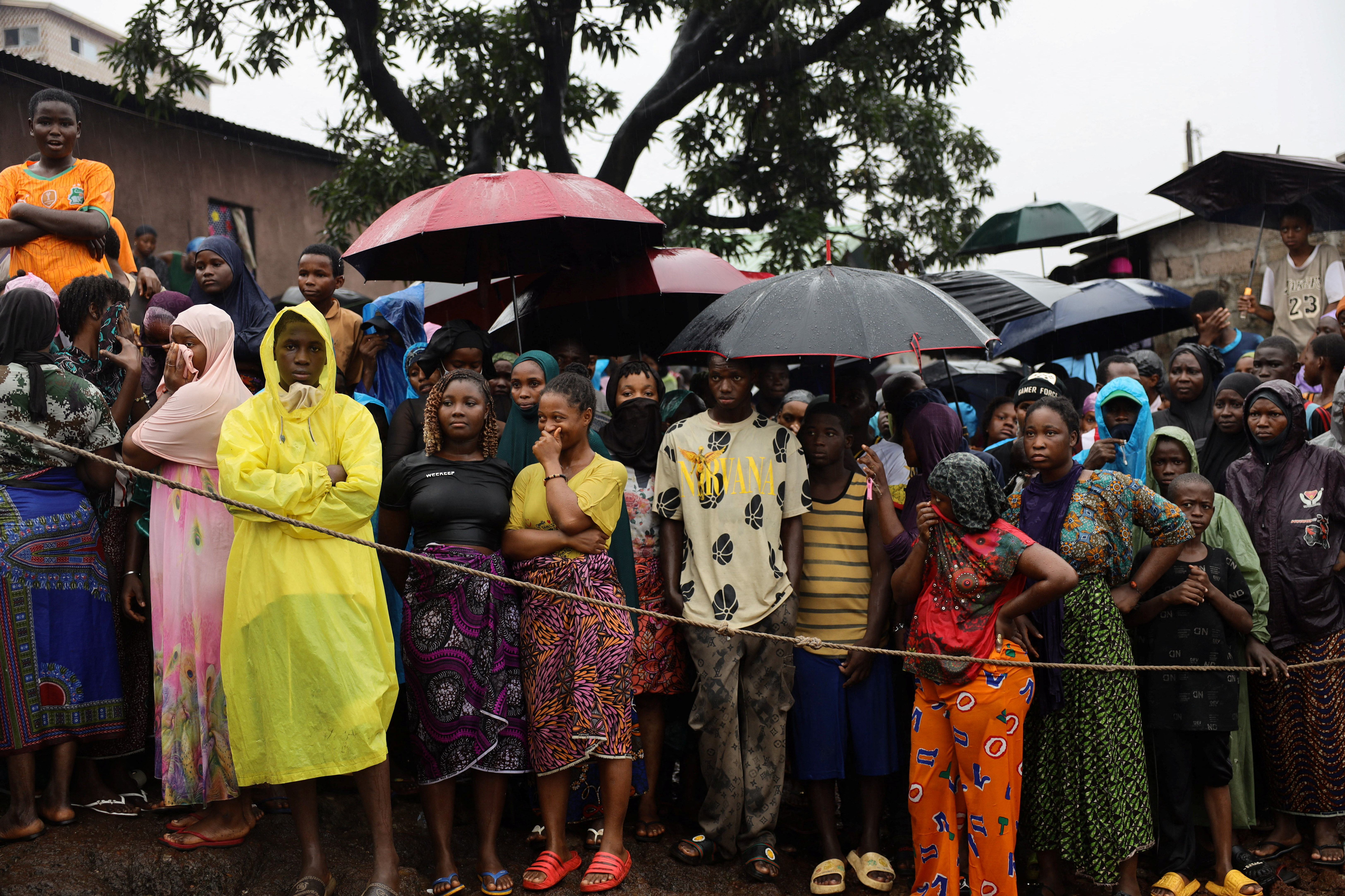 Guinea rescue workers dig for survivors after landfill collapse