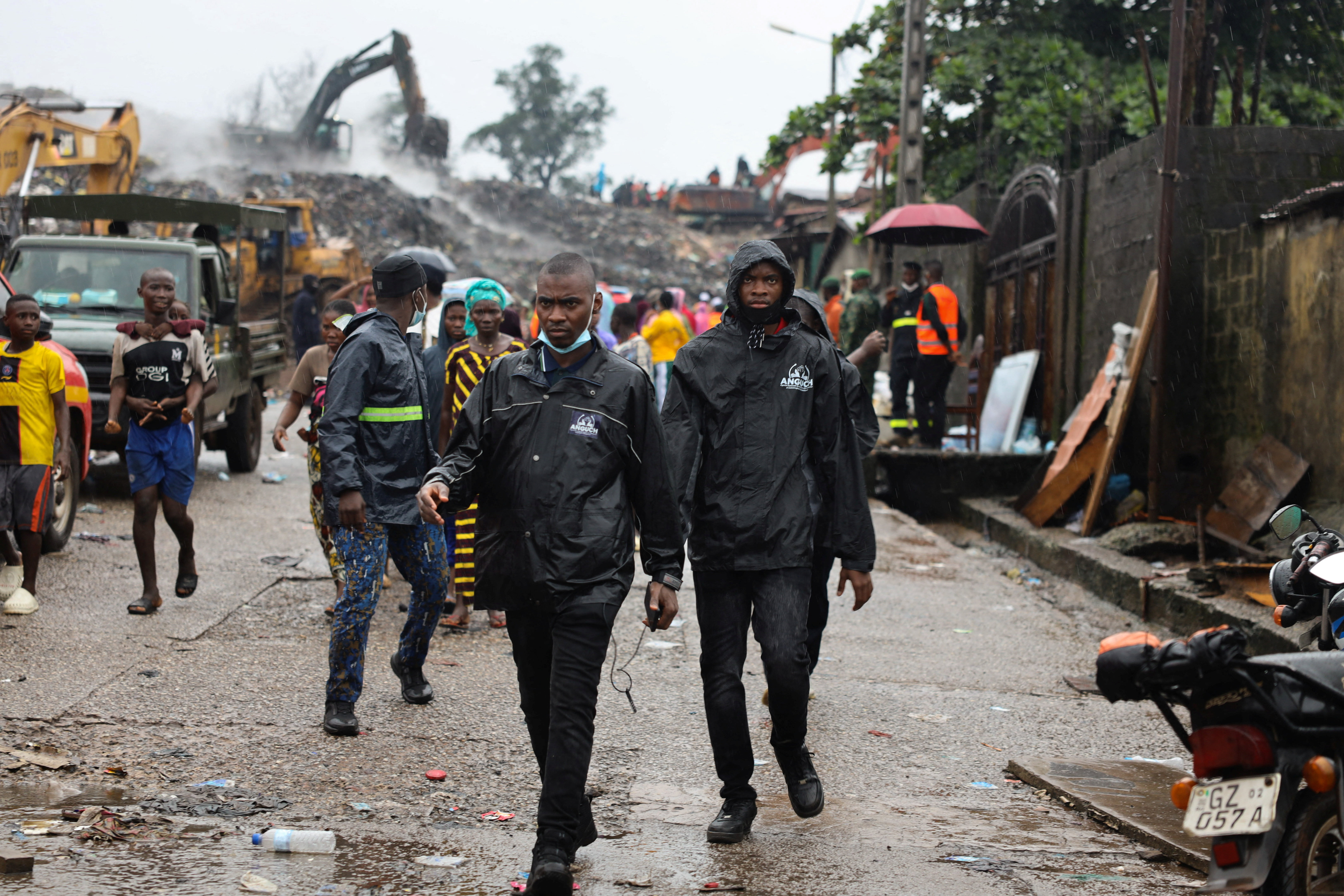 Guinea rescue workers dig for survivors after landfill collapse