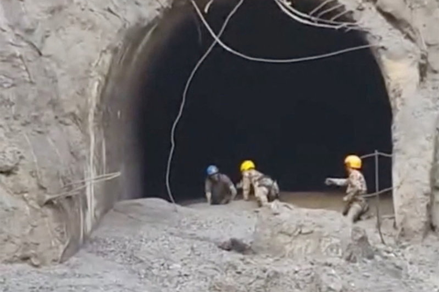 Rescuers evacuate a person from a tunnel of a hydropower project, in the aftermath of flash floods and a mudslide, in Rasuwa, Nepal, in this still image from handout video released August 28, 2026. PMO Nepal/Handout via REUTERS THIS IMAGE HAS BEEN SUPPLIED BY A THIRD PARTY. NO RESALES. NO ARCHIVES. MANDATORY CREDIT.