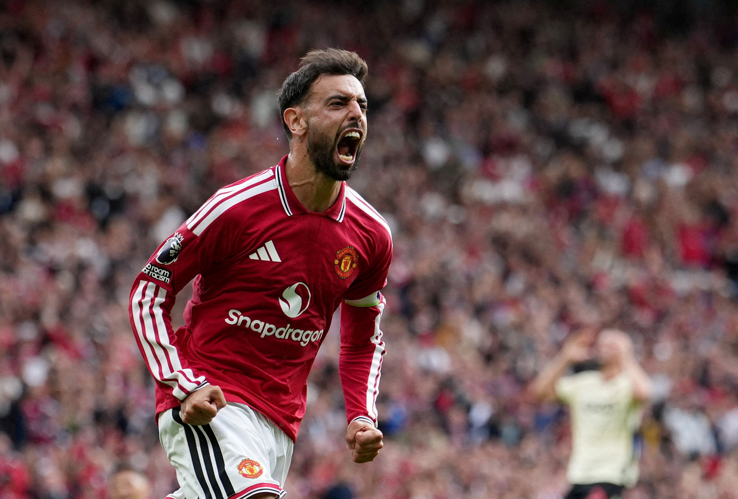 Manchester United's Bruno Fernandes celebrates scoring their first goal