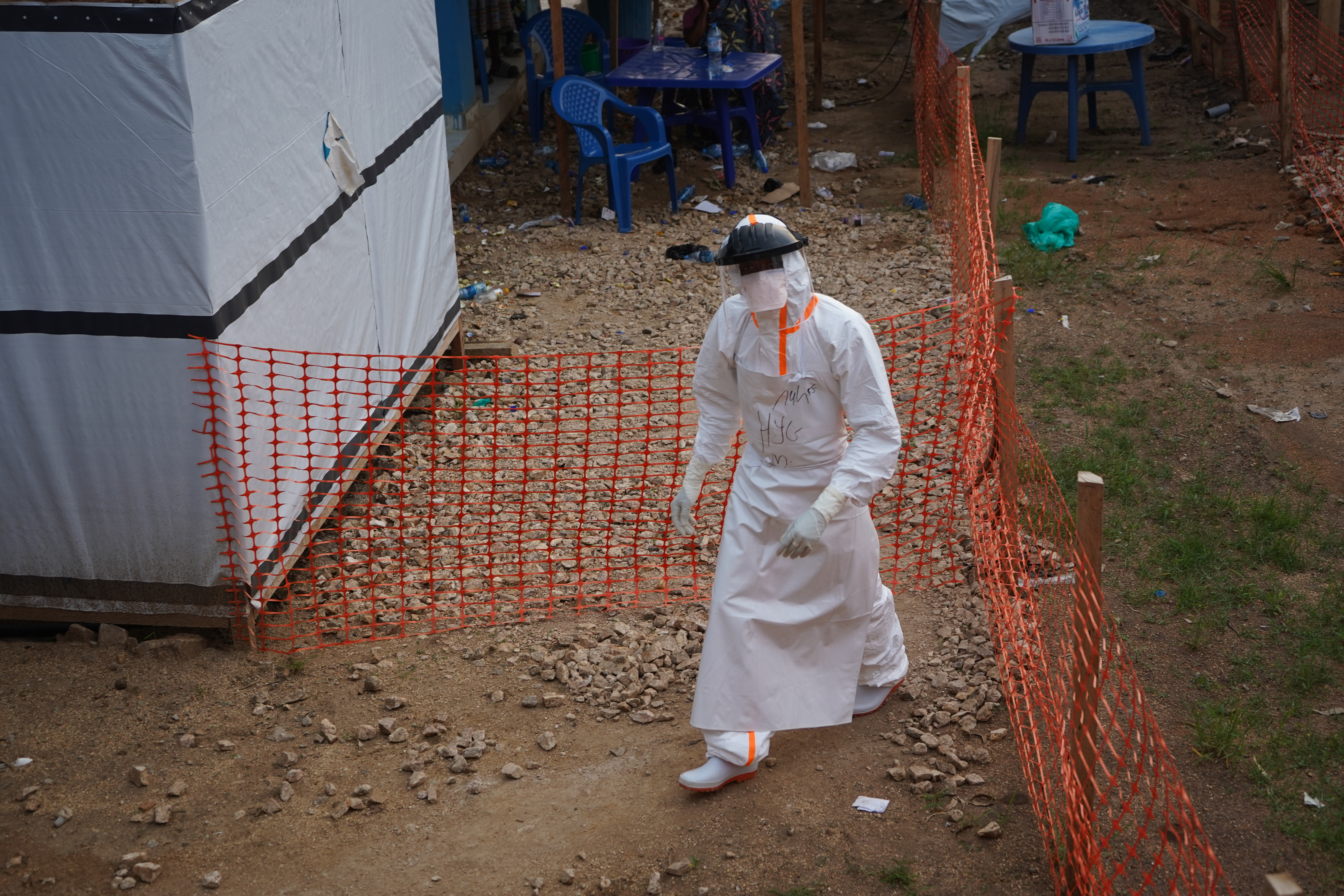 A hygienist works at an Ebola treatment centre in Bunia, Ituri Province, Democratic Republic of the Congo [Prosper Heri Ngorora/Al Jazeera]