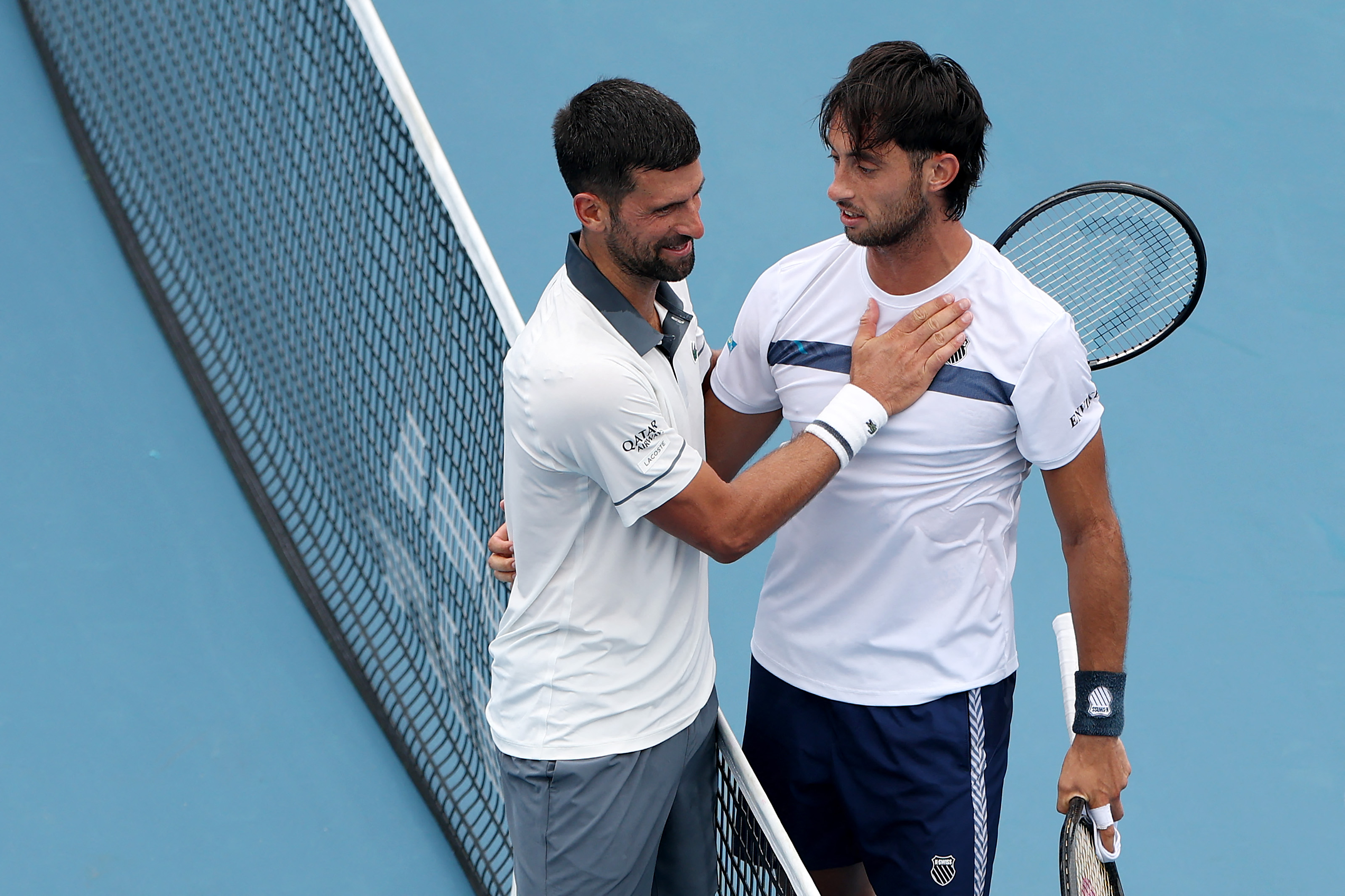 Djokovic congratulates Tirante, right, after the match