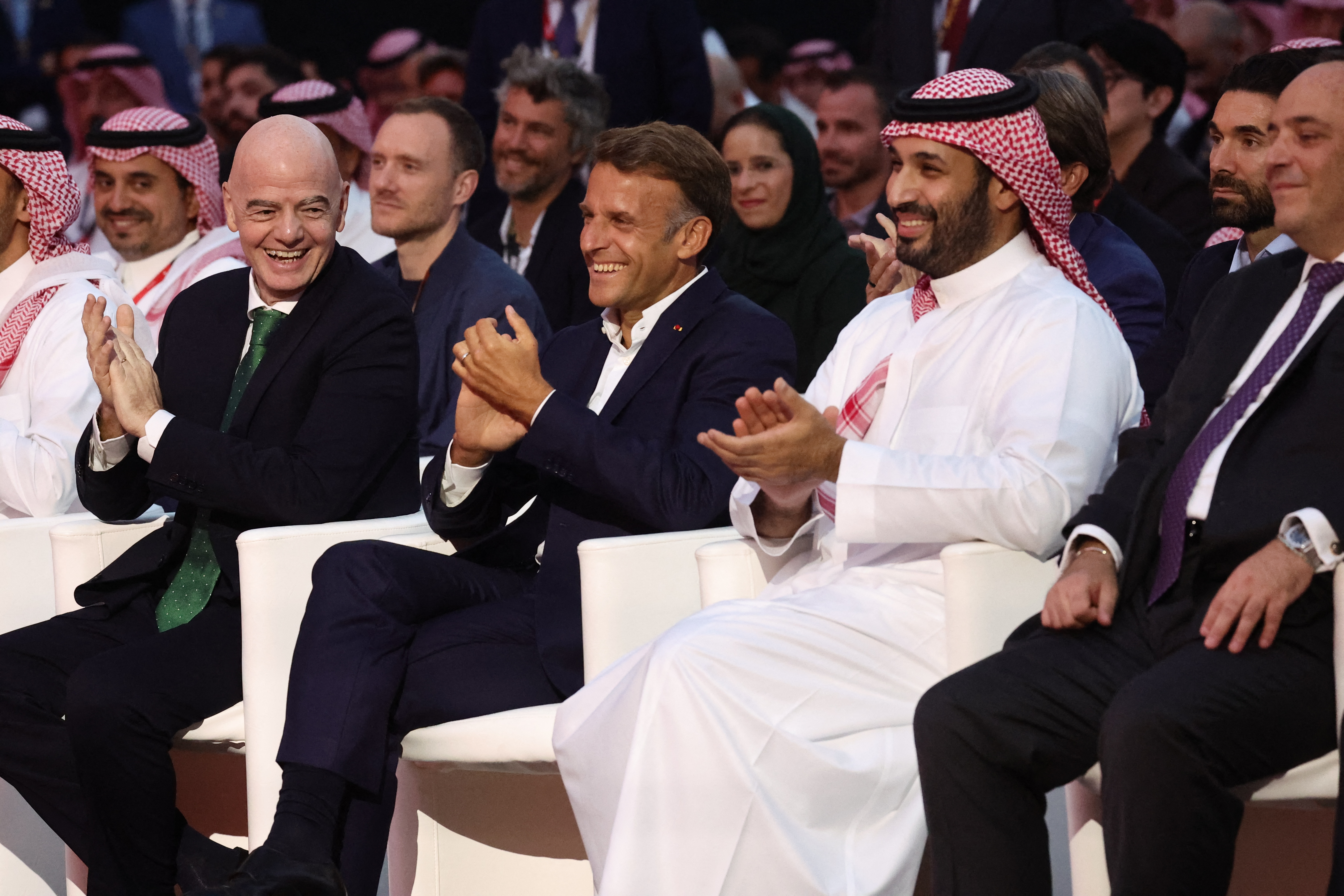 President of FIFA Gianni Infantino (2ndL), French President Emmanuel Macron and the Crown Prince and Prime Minister of Saudi Arabia Mohammed bin Salman attend the closing ceremony of the Esports World Cup at the Grand Palais in Paris, France, on August 23, 2026. (Photo by Teresa SUAREZ / POOL / AFP)