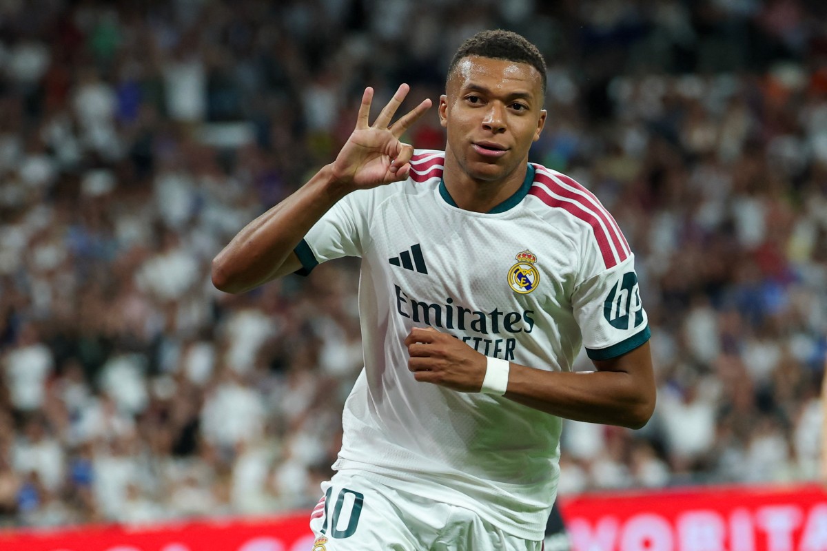 Real Madrid's French forward #10 Kylian Mbappe celebrates scoring a hat-trick and his team's fourth goalduring the Spanish league football match between Real Madrid CF and Real Sociedad