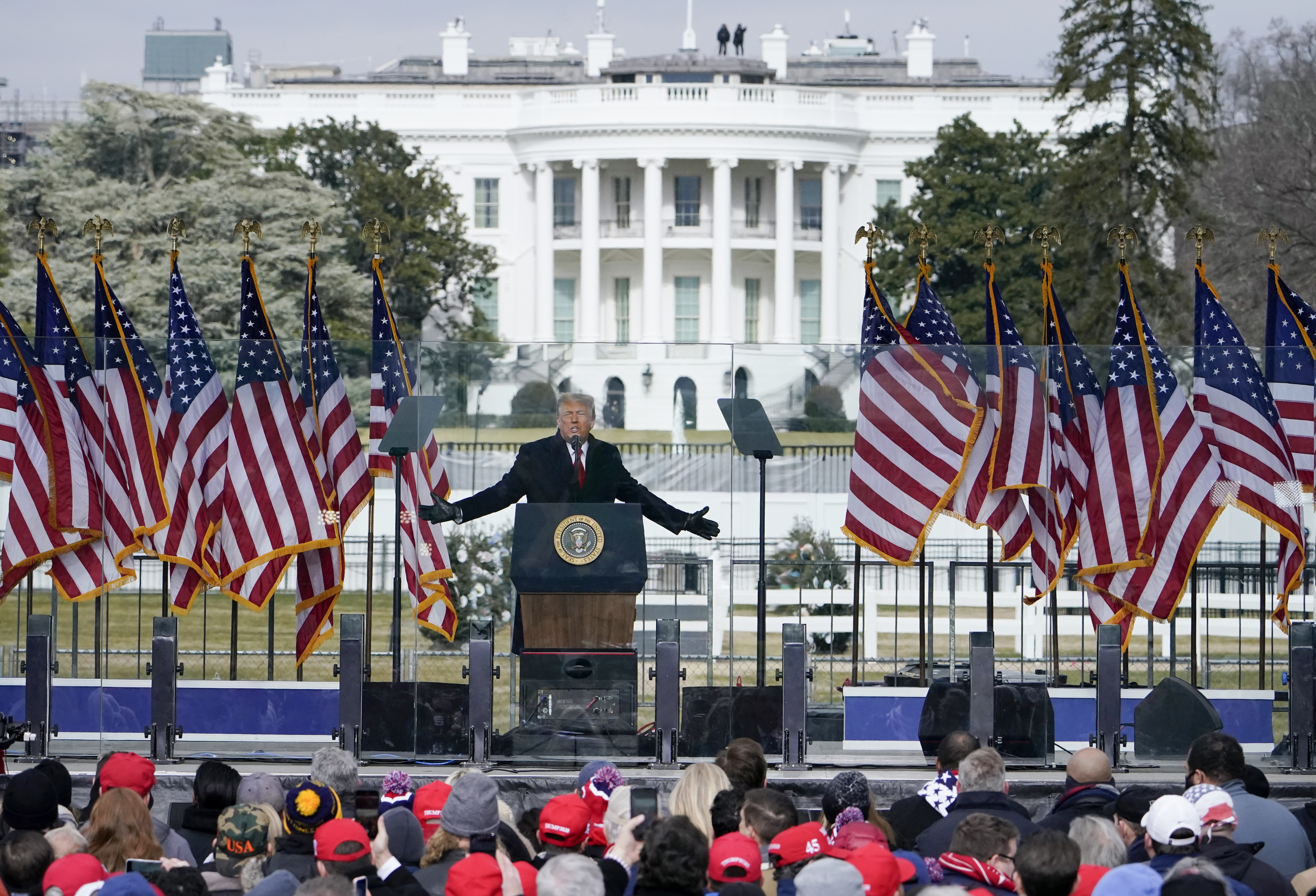 FILE - With the White House in the background, President Donald Trump speaks at a rally in Washington, Jan. 6, 2021. The January 6 committee investigation of the aftermath of the 2020 presidential election and the events leading up to the capitol insurrection raise questions about former President Donald Trump's role and whether he committed crimes. As illuminating have been the various schemes and talking points that have come up from witnesses that highlight what a president has the authority to do. Government and legal experts say the bigger question is can limits be put on that presidential authority to make sure there are no repeats of 2020 in future administrations. (AP Photo/Jacquelyn Martin, File)