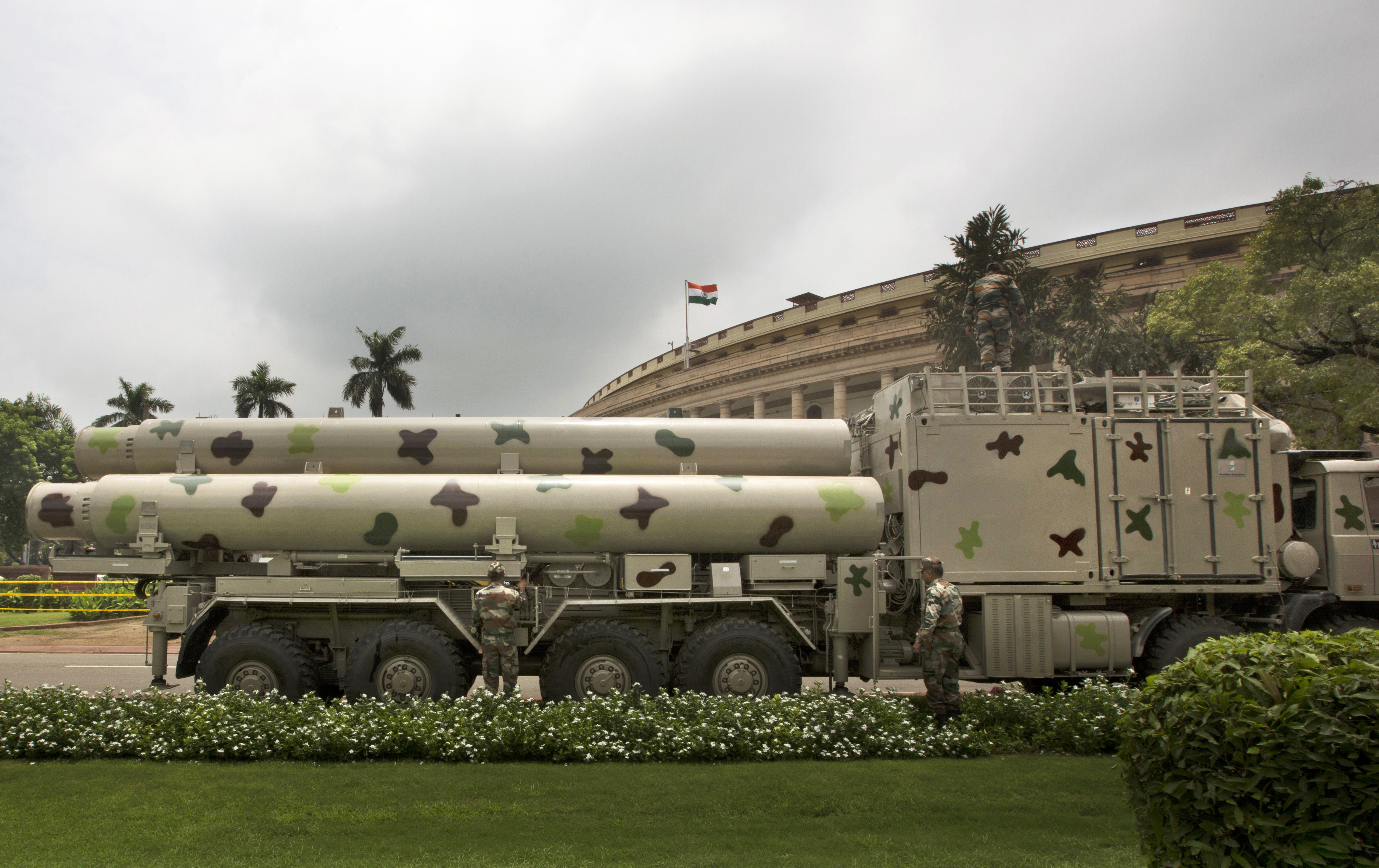 FILE - Supersonic BrahMos missiles are seen at the parliament house premises for an upcoming exhibition in New Delhi, India, on Aug. 1, 2016.