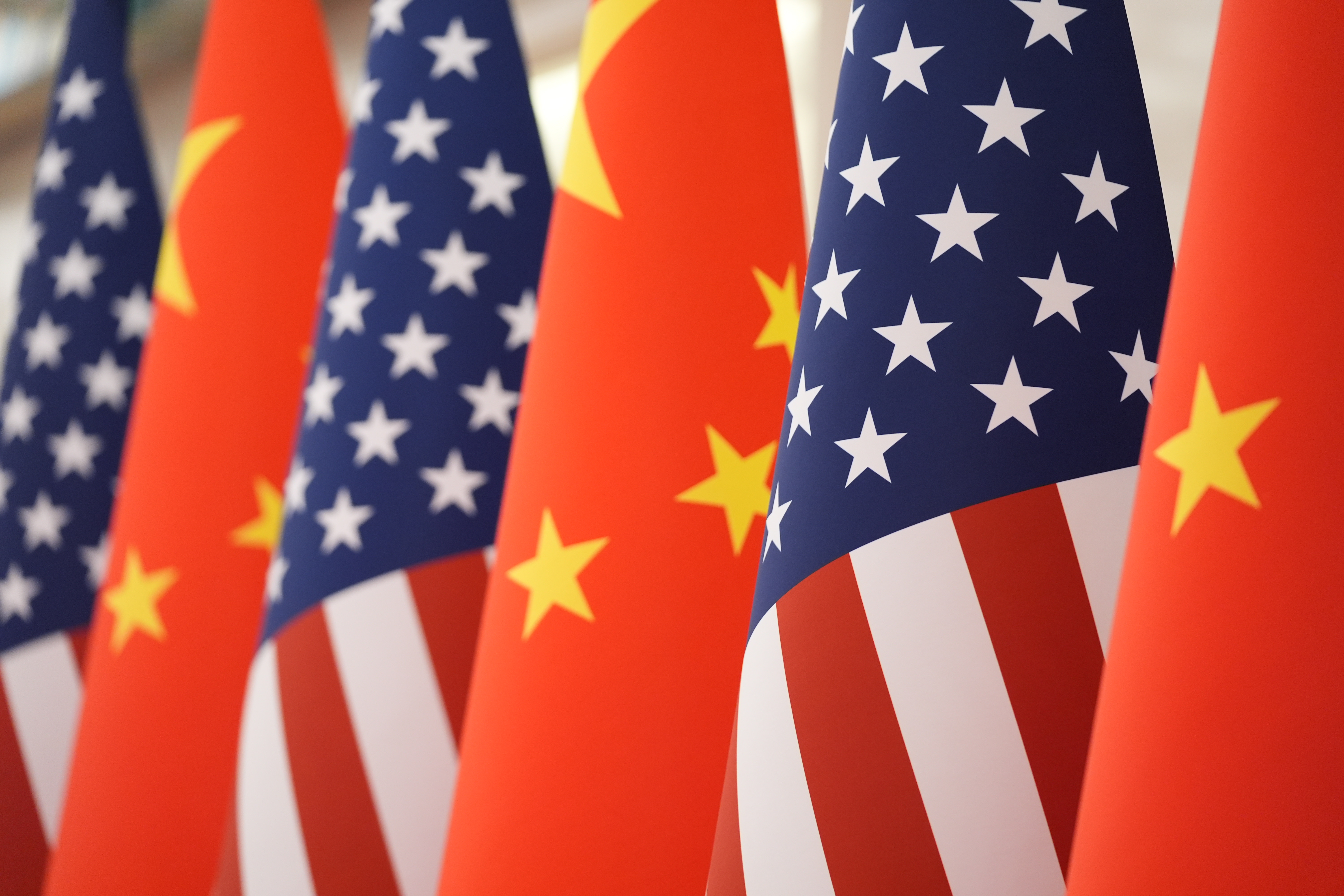 FILE - The U.S. and Chinese flags are pictured at the Great Hall of the People prior to the state dinner of President Donald Trump and Chinese President Xi Jinping, May 14, 2026, in Beijing. (AP Photo/Mark Schiefelbein, File)