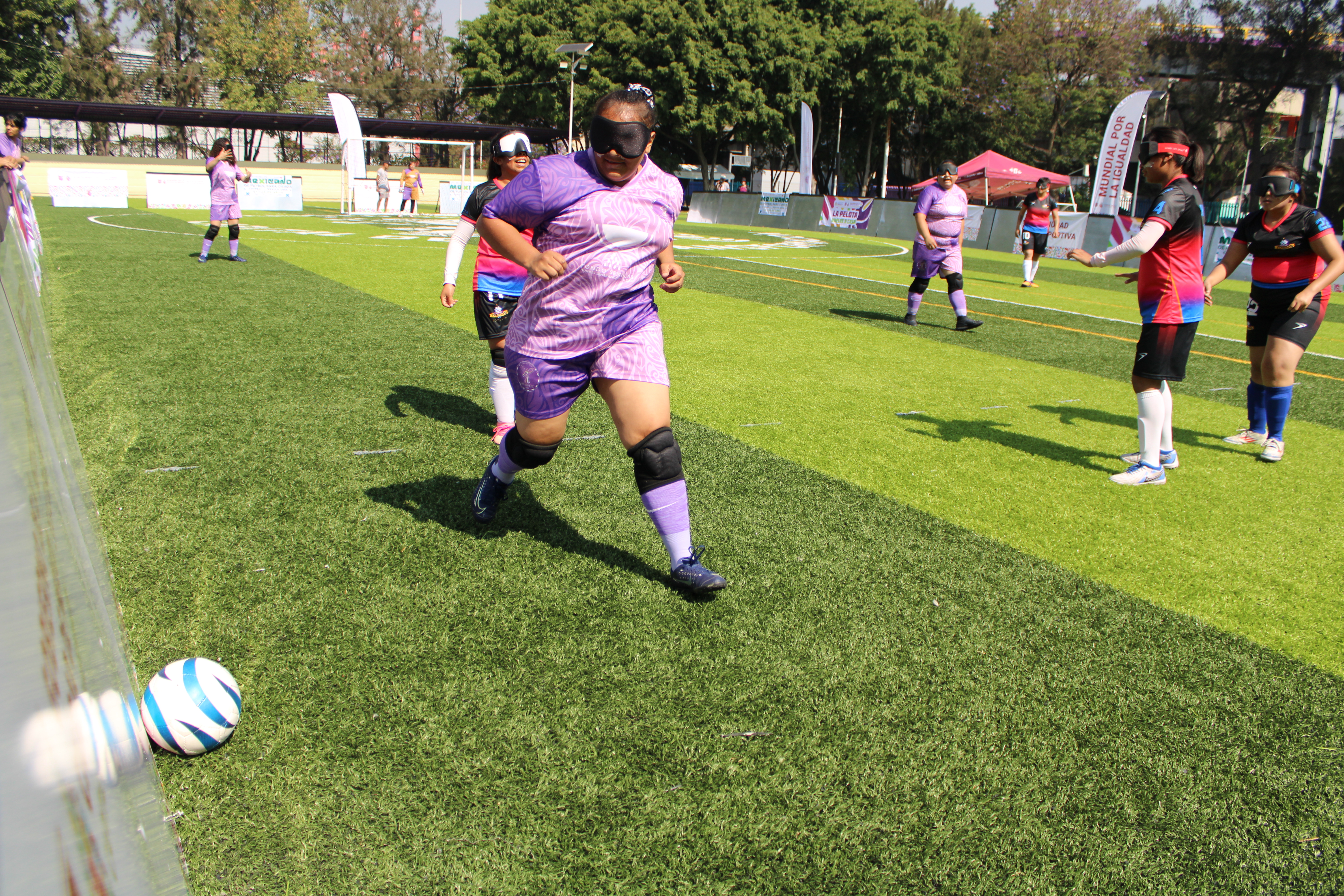Chilangas FC striker Alexandra Ramirez, 20, steals the ballot from her opponent