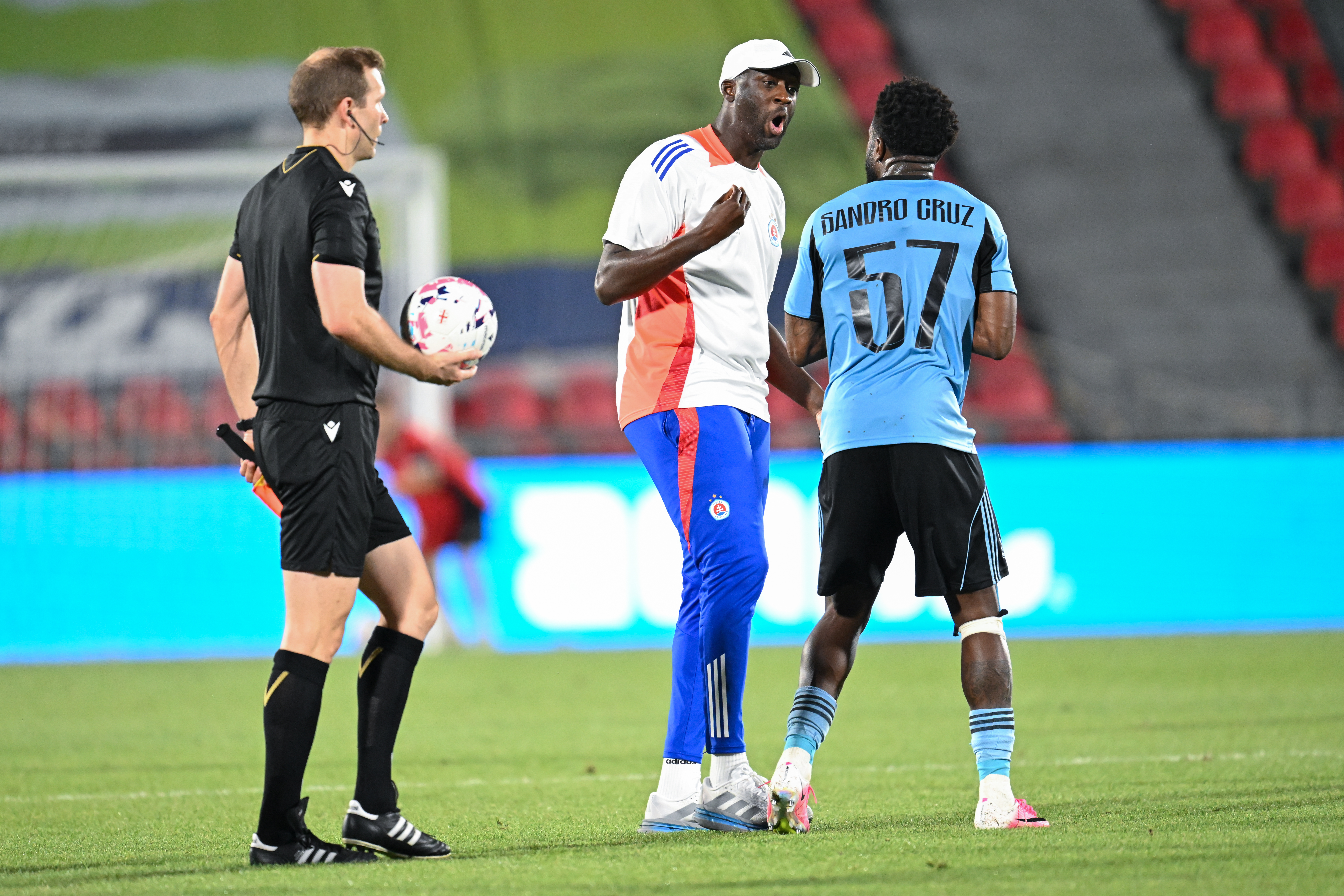 TBILISI, GEORGIA - JULY 21: Yaya Toure, head coach of Slovan Bratislava, reacts with Sandro Cruz of Slovan Bratislava during the UEFA Champions League 2026/27 second qualifying round first leg match between Iberia Tbilisi and Slovan Bratislava at Mikheil Meskhi Stadium on July 21, 2026 in Tbilisi, Georgia. (Photo by Levan Verdzeuli/Getty Images)