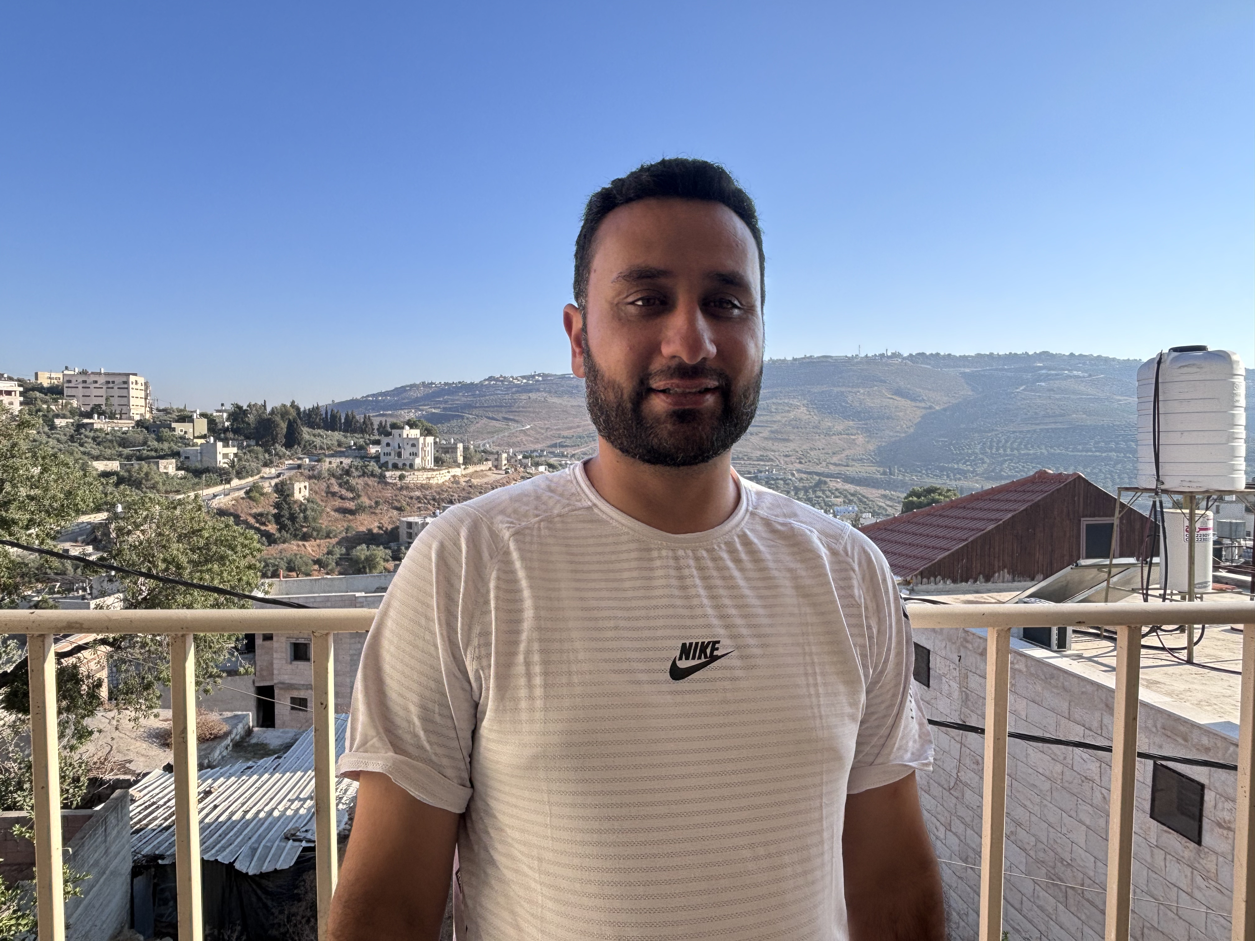 Ghassan Najjar, a member of the Burin Land and Farming Cooperative [Al Jazeera]
