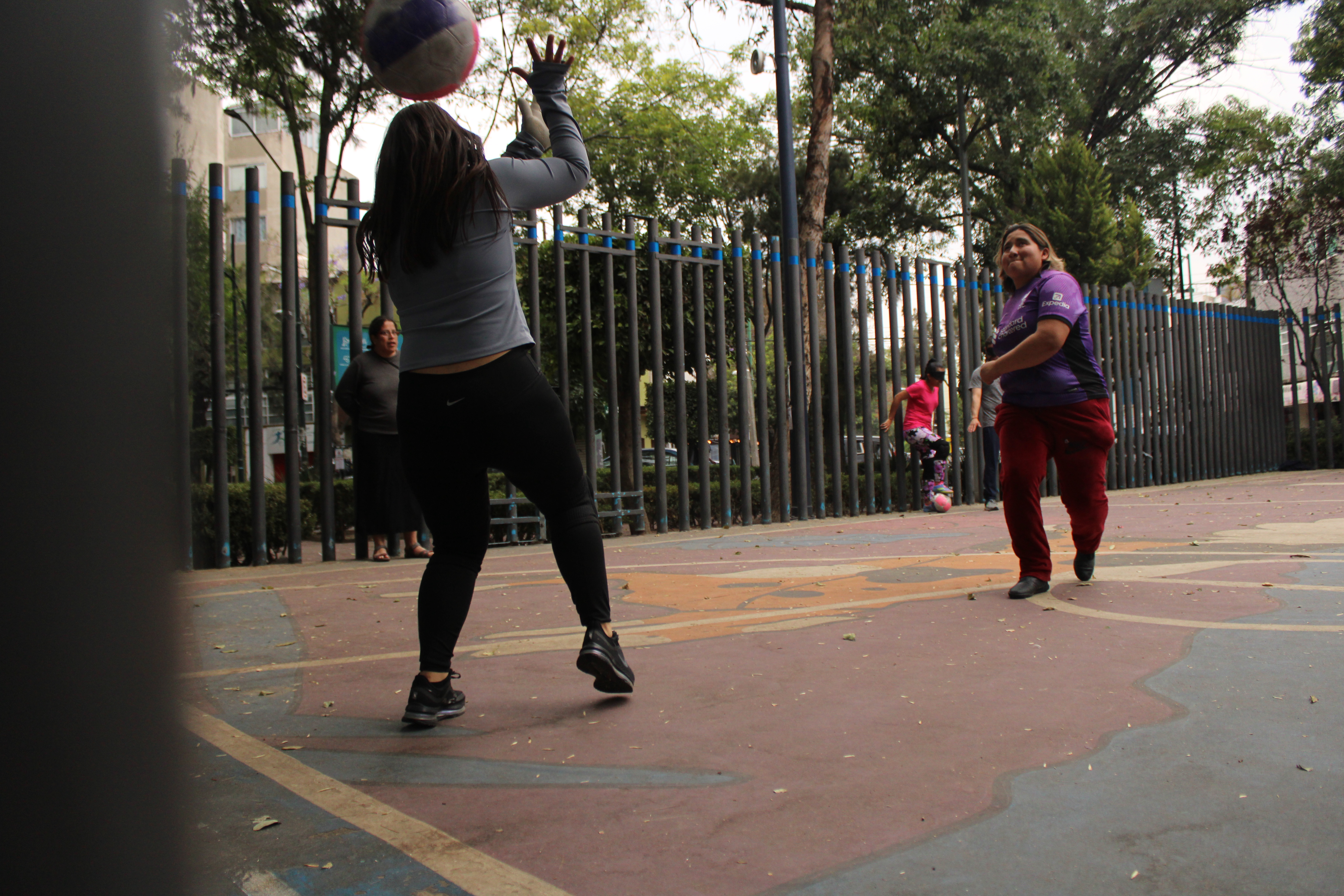 Pau blasts the ball past the goalkeeper during an evening practice session in Moderna Park in Mexico City. As one of Chilangas FC’s strongest attackers, she tracks the ball by sound and instinct