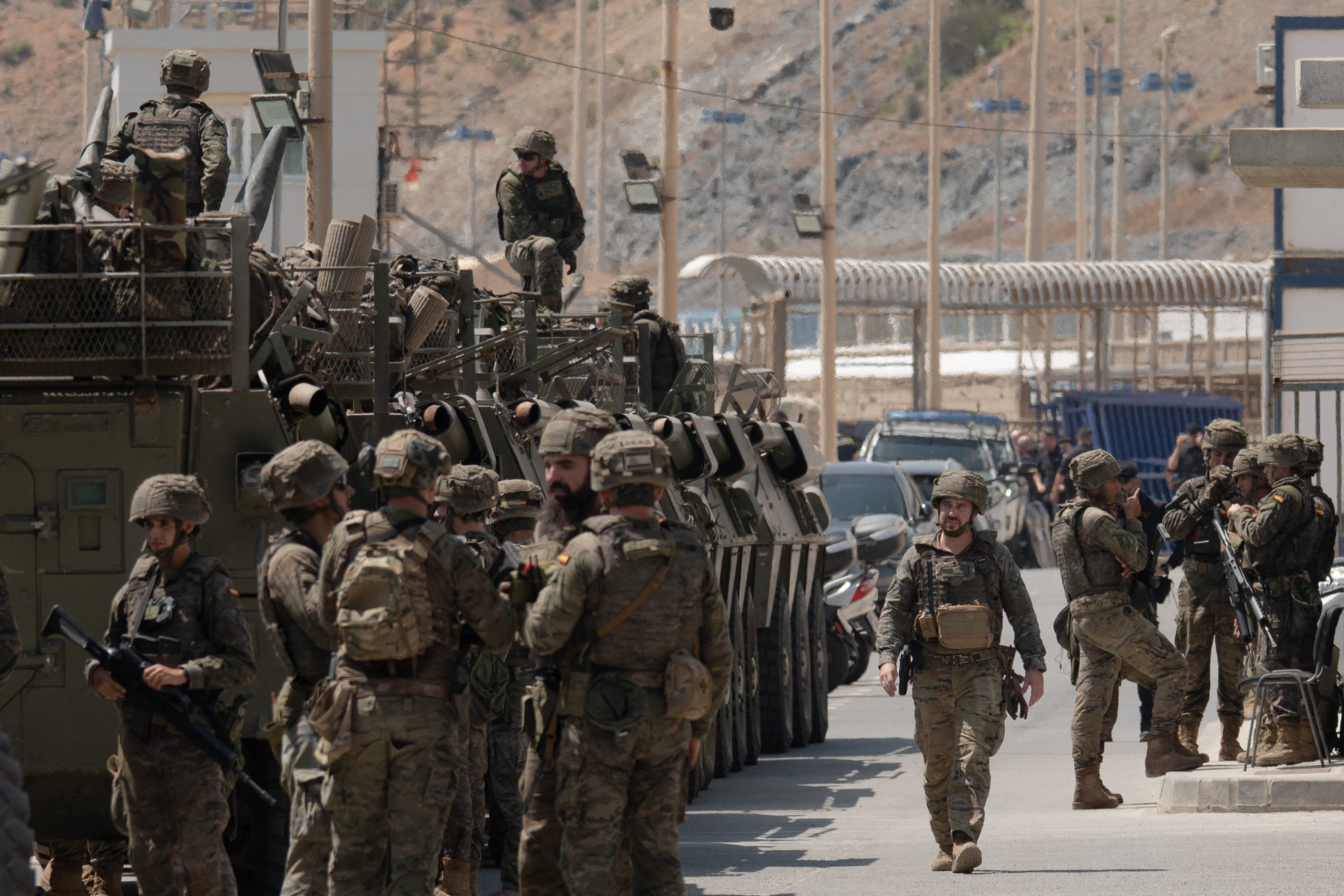 Spanish soldiers are pictured at the border fence between Morocco and the Spanish North African enclave of Ceuta on August 15, 2026.