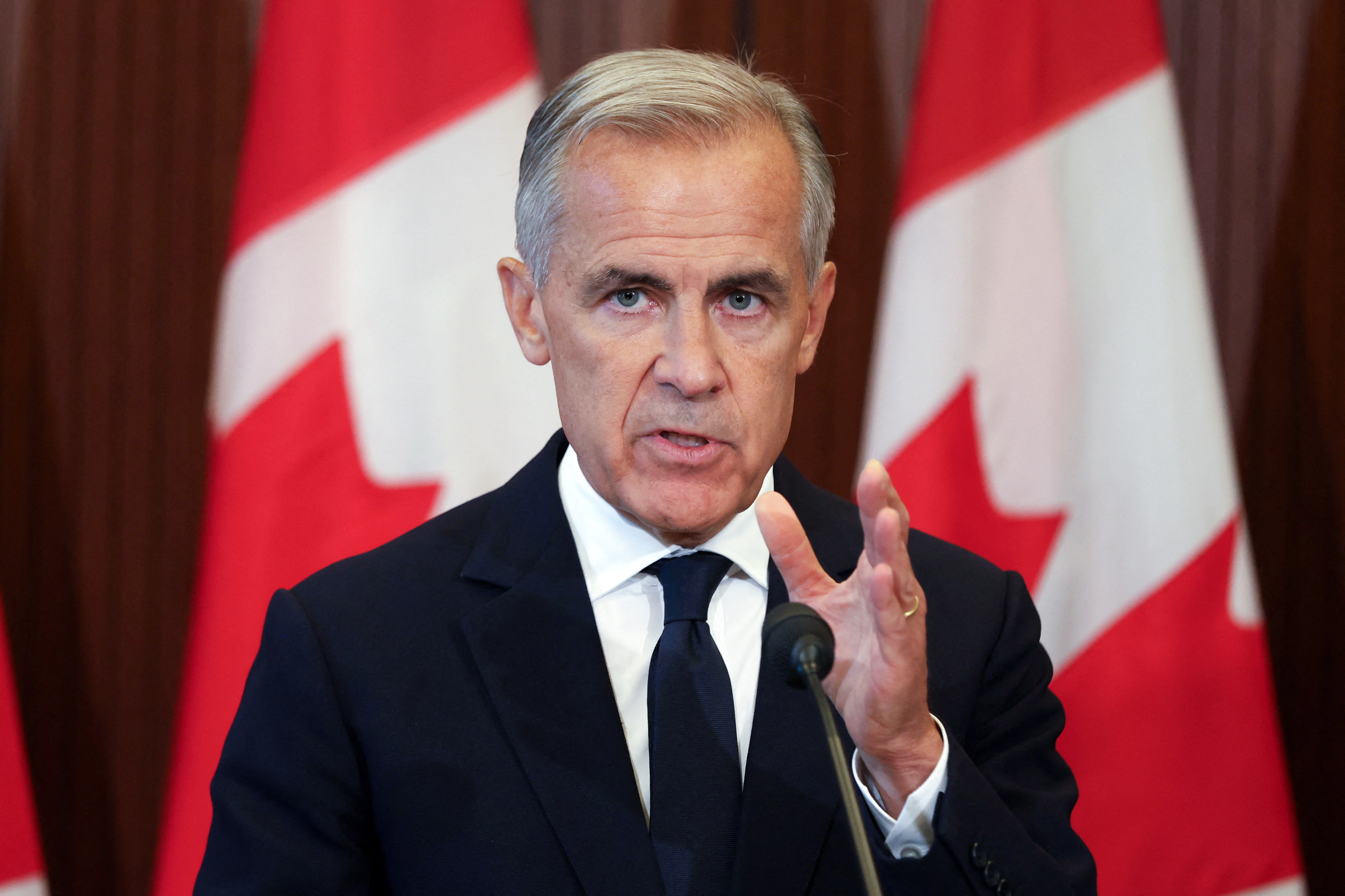 Canadian Prime Minister Mark Carney speaks at a press conference in Ottawa, Ontario, on August 22, 2026 after trade talks with the US collapsed.