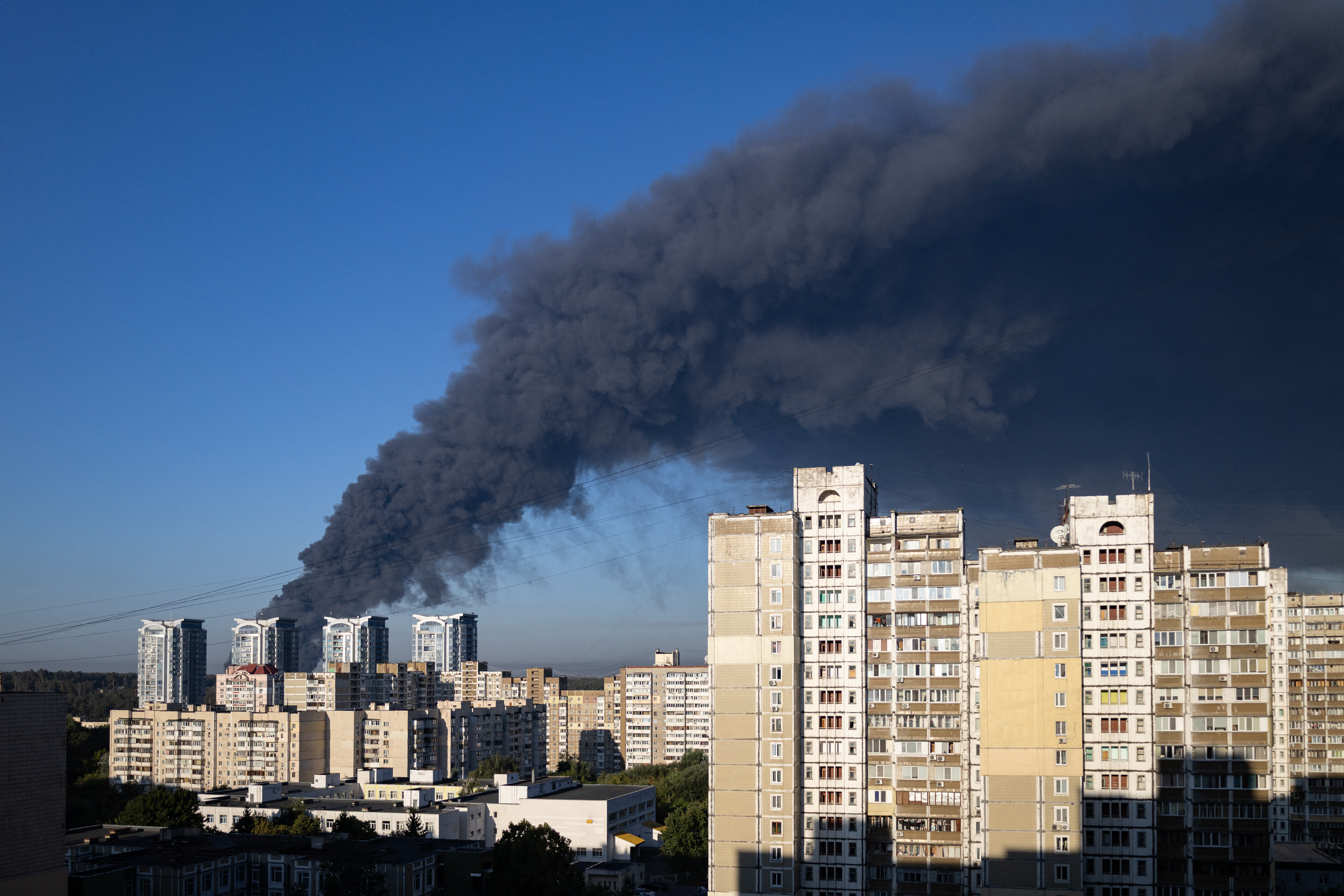 TOPSHOT - This photograph shows smoke rising following a Russian air attack in Kyiv on August 29, 2026, amid the Russian invasion of Ukraine.