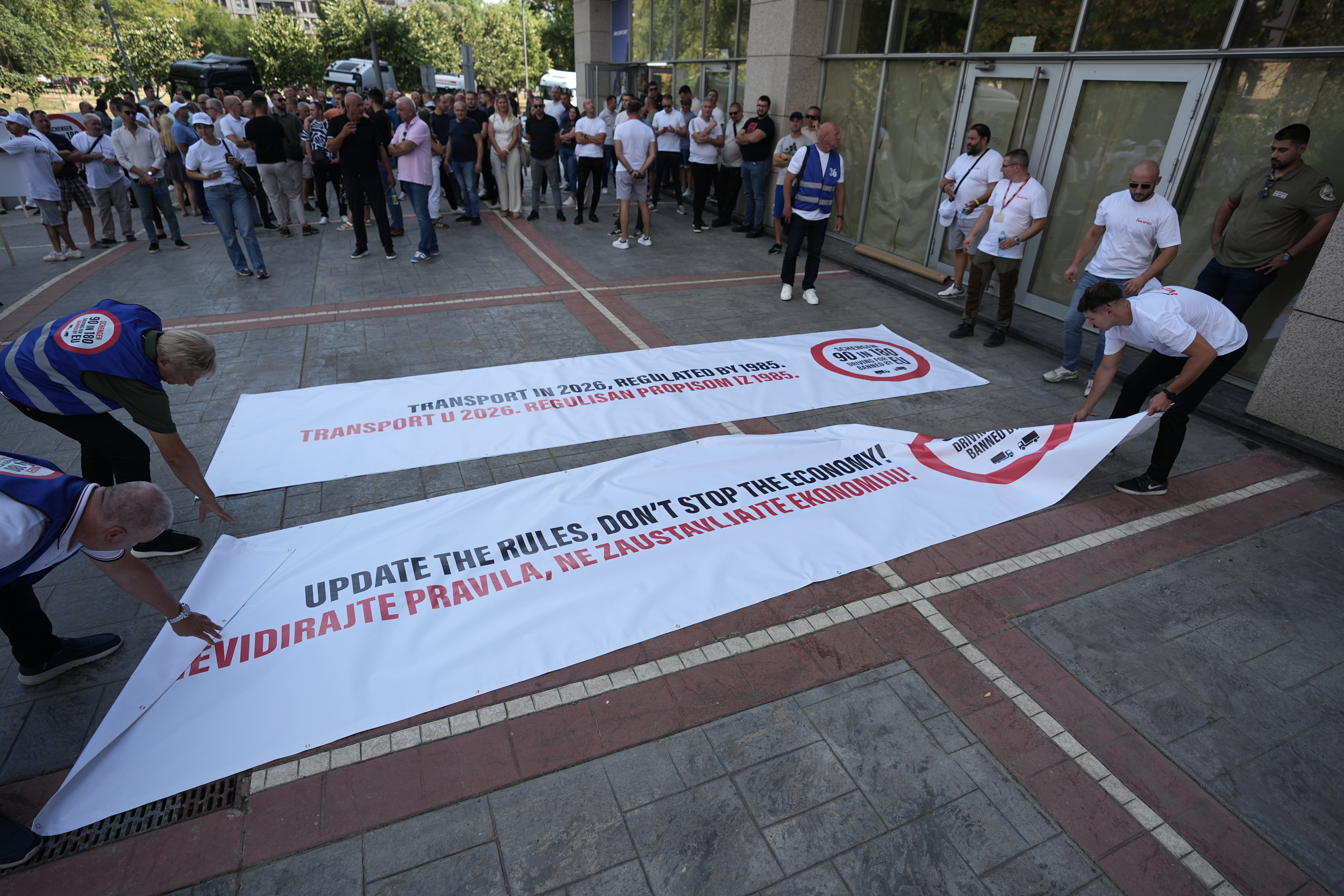 Truckers protest in front of the EU delegation building against travel bans imposed on Balkan truck drivers to work in European Union countries in Belgrade, Serbia, Monday, Aug. 31, 2026. (AP Photo/Darko Vojinovic)