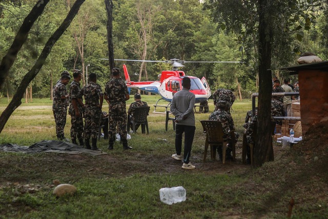 An army camp in Nuwakut, Nepal, where helicopters are being used for rescue efforts