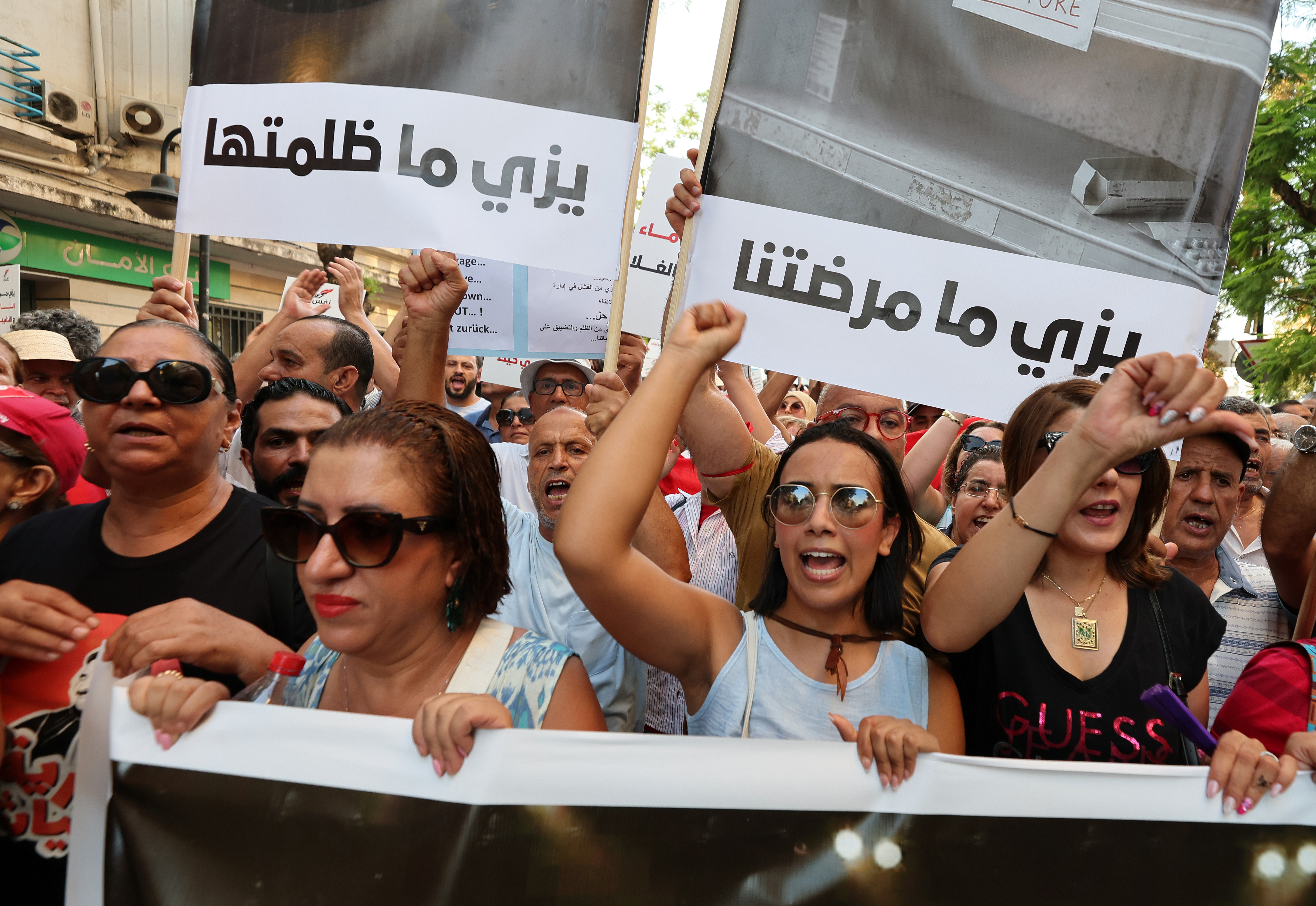 Protesters voice anger as shortages and rising living costs increasingly converge with demands for political change under President Kais Saied [Mohamed Messara/EPA]