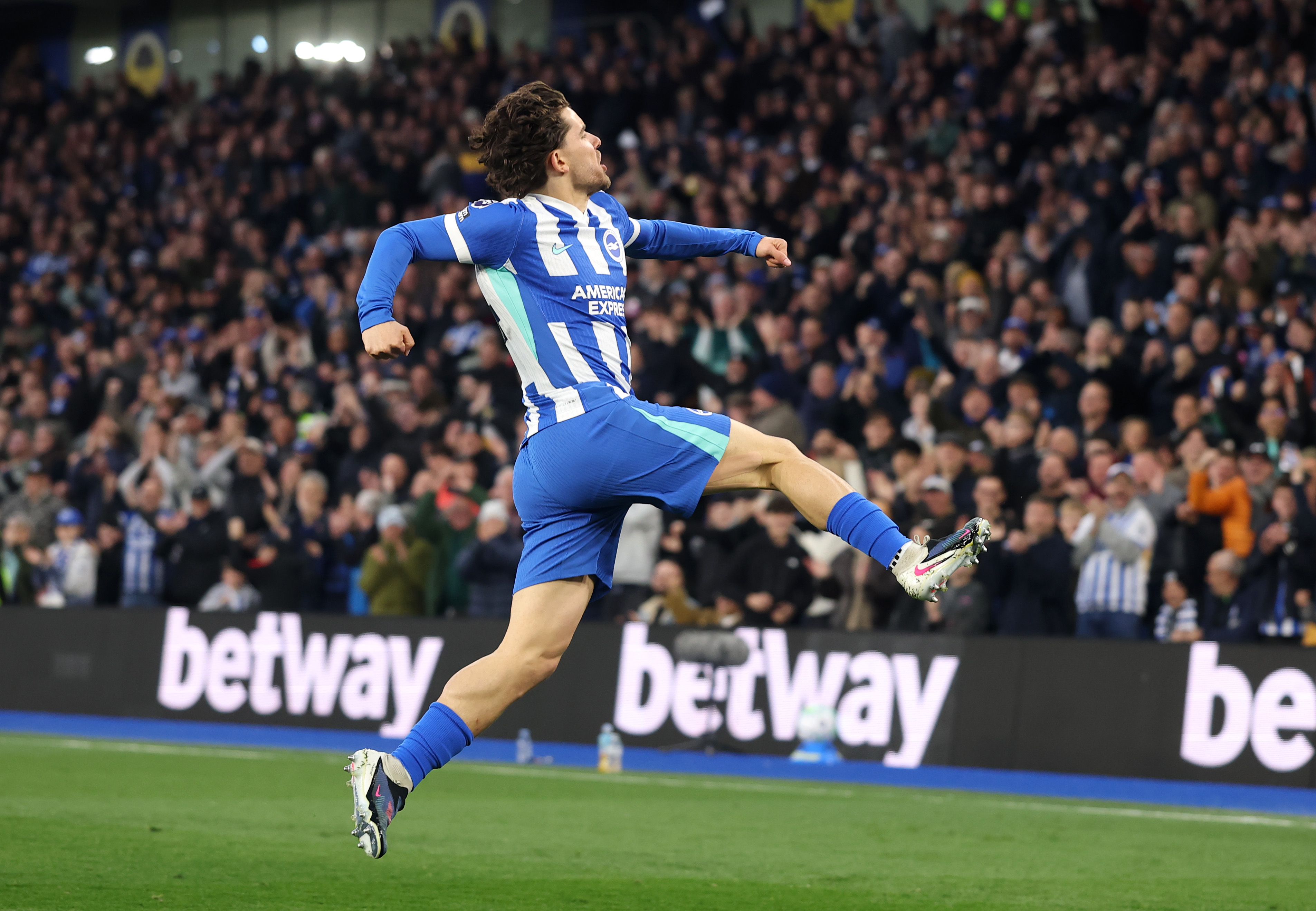 BRIGHTON, ENGLAND - APRIL 21: Ferdi Kadioglu of Brighton & Hove Albion celebrates scoring his team's first goal during the Premier League match between Brighton & Hove Albion and Chelsea at Amex Stadium on April 21, 2026 in Brighton, England. (Photo by Warren Little/Getty Images)