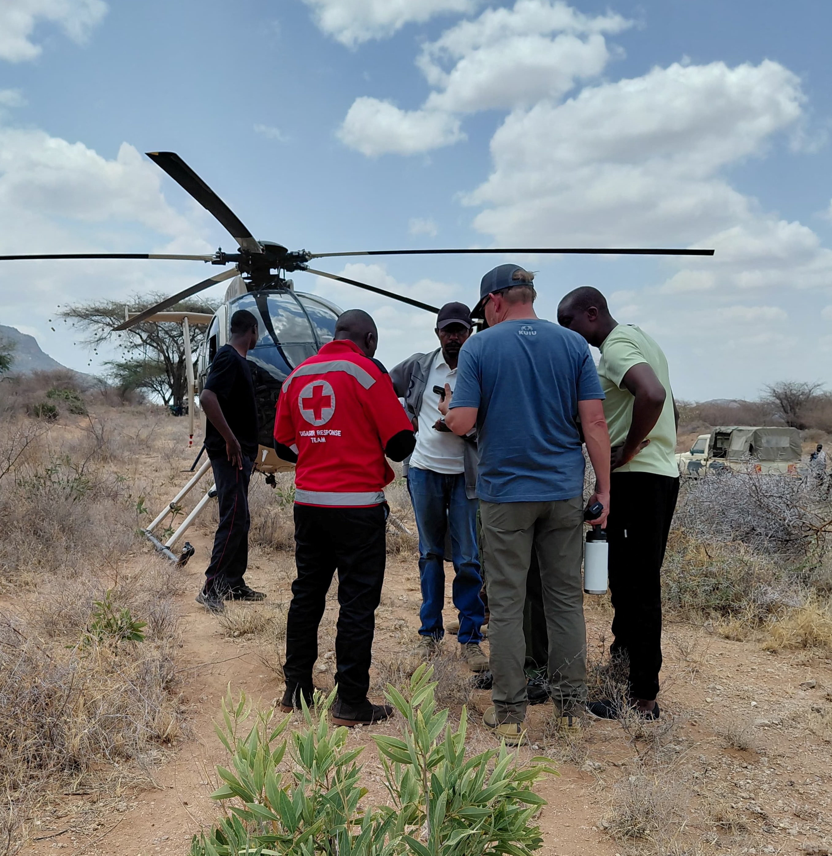 Rescue officials work at the site of a tourist helicopter crash that caused multiple casualties, according to the police, in Samburu County, Kenya, August 19, 2026. Kenya Red Cross/Handout via REUTERS THIS IMAGE HAS BEEN SUPPLIED BY A THIRD PARTY. NO RESALES. NO ARCHIVES. MANDATORY CREDIT.
