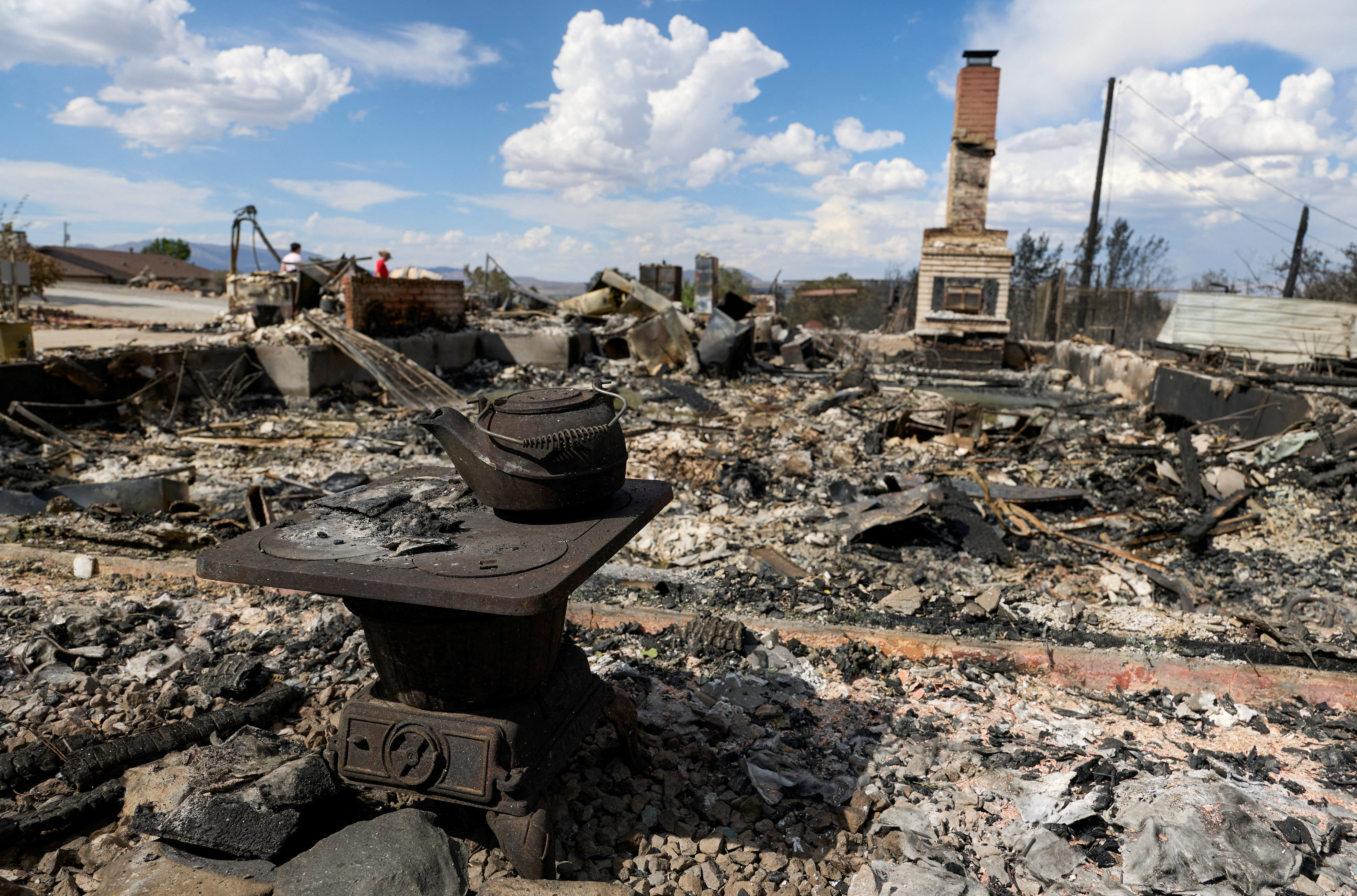 An old stove and teakettle next to a home that burned down during the Hawk Fire in Reno, Nevada, U.S., August 24, 2026. REUTERS/Fred Greaves TPX IMAGES OF THE DAY